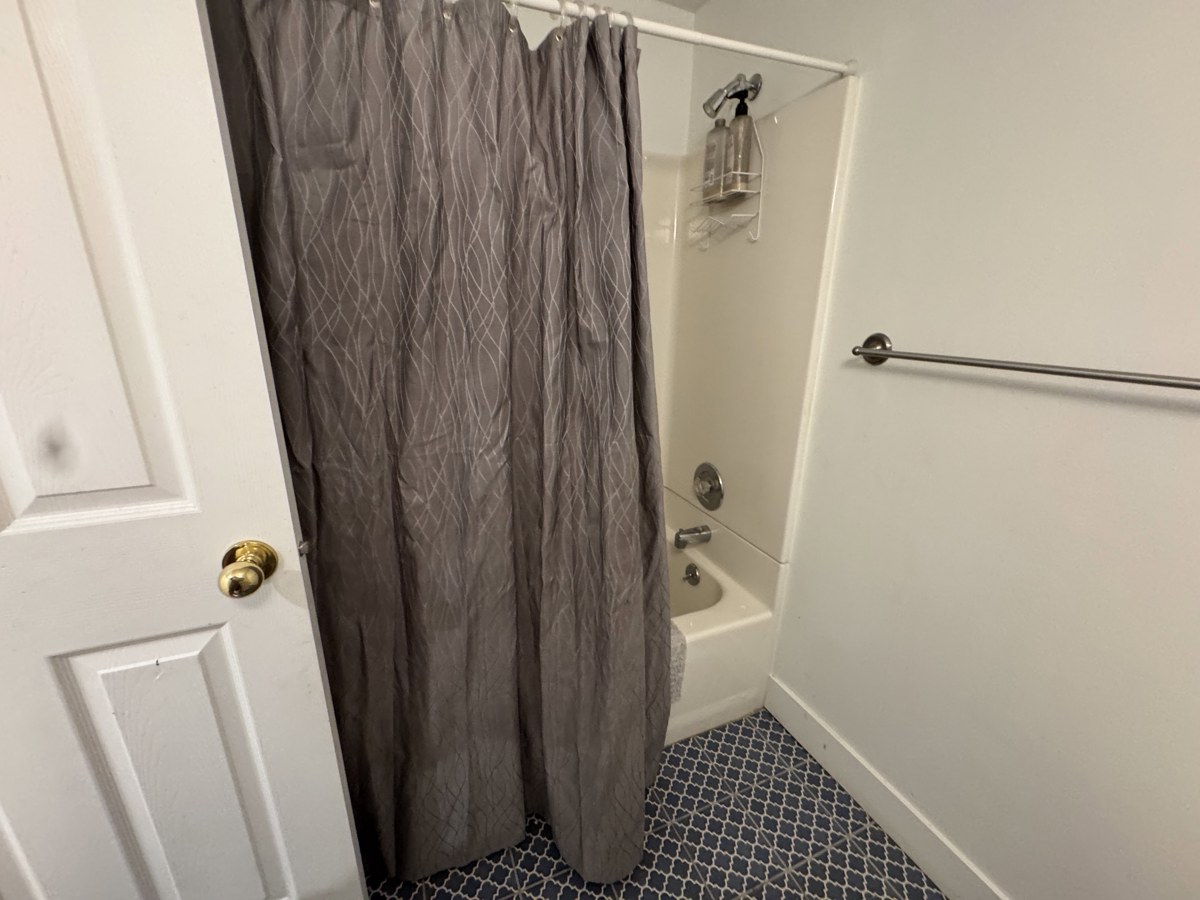 Tub and shower combination with chrome fixtures