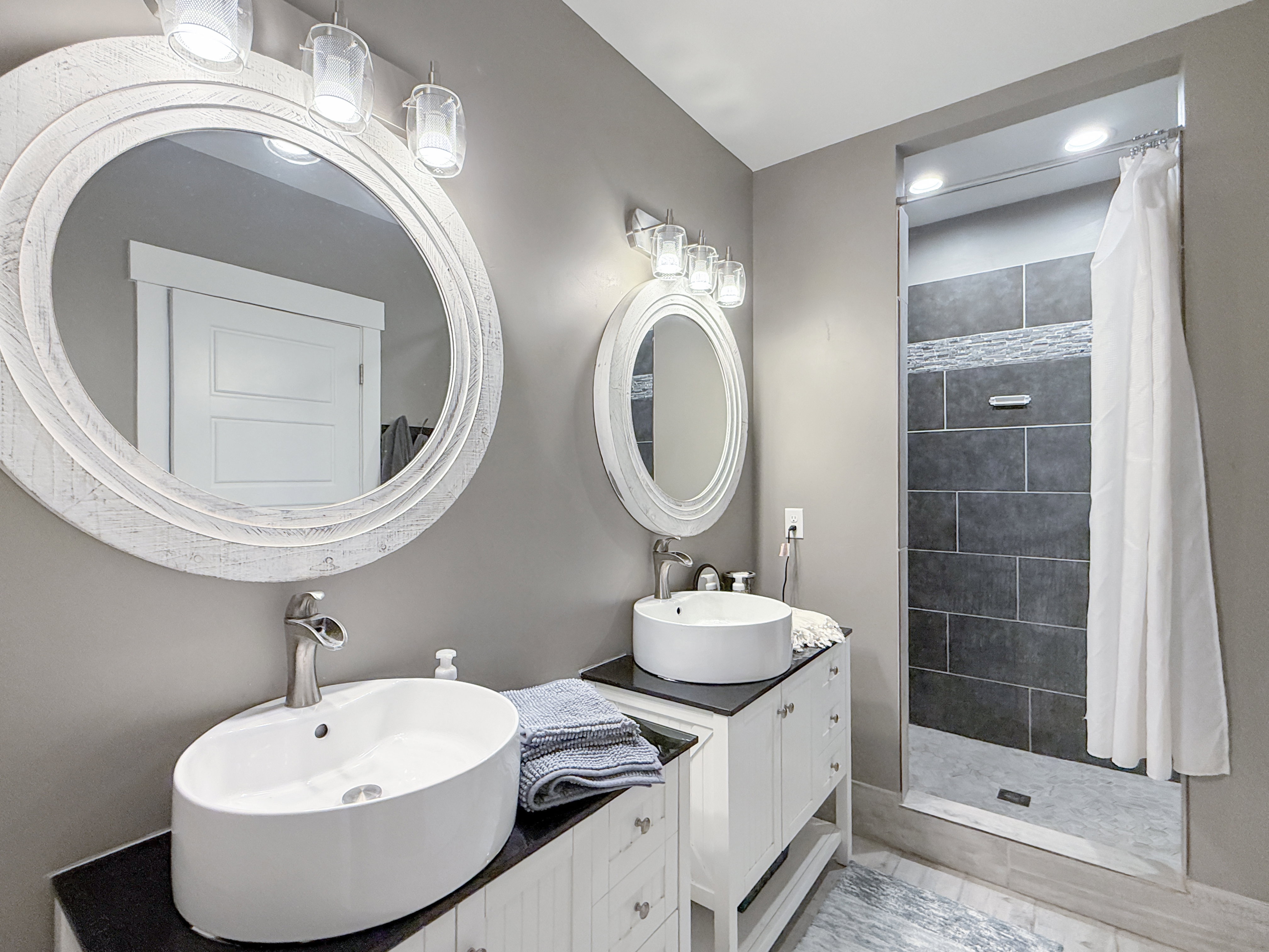 Basement Bathroom with Double vanities