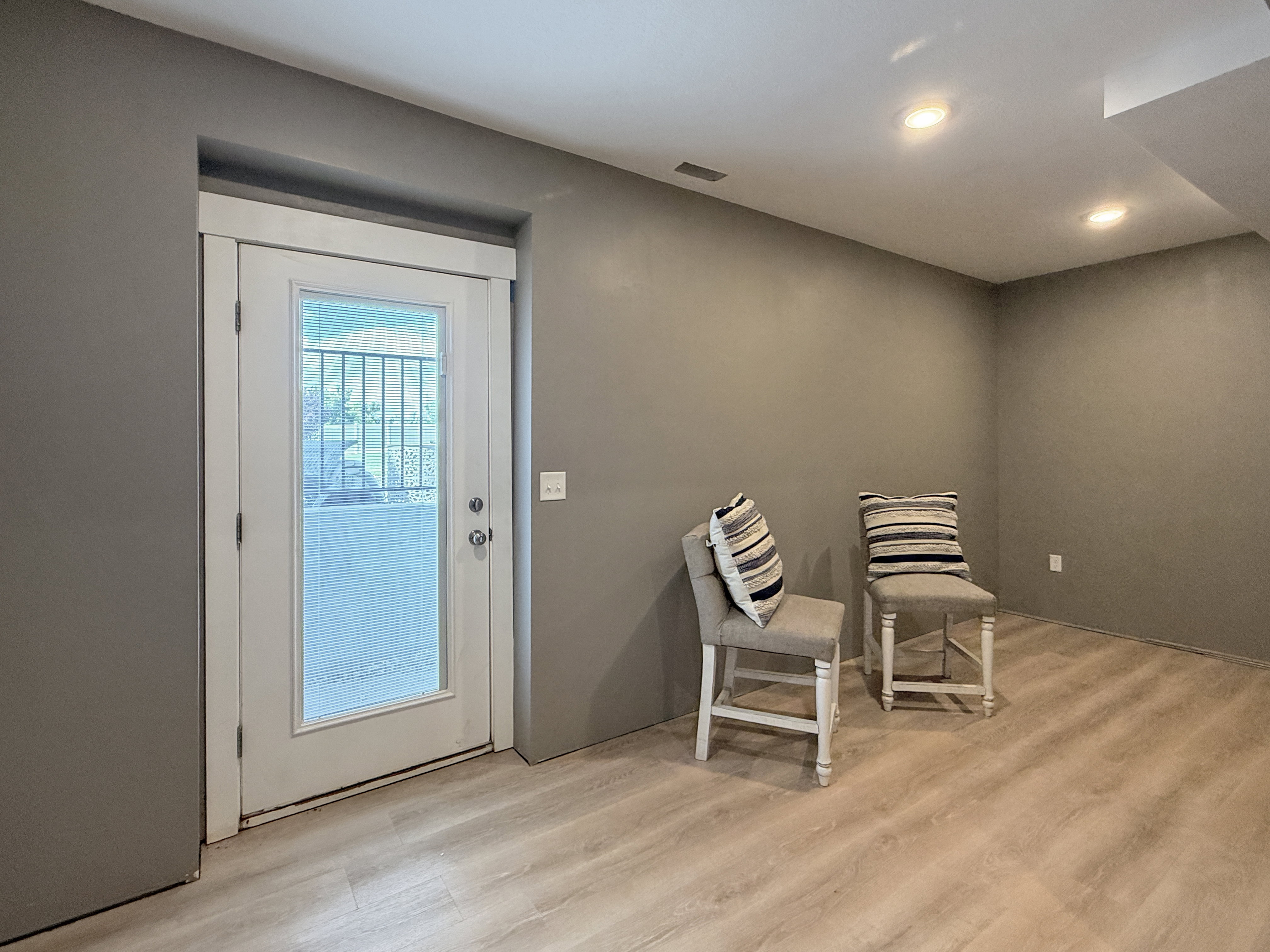 extra game/rec room with walk out door