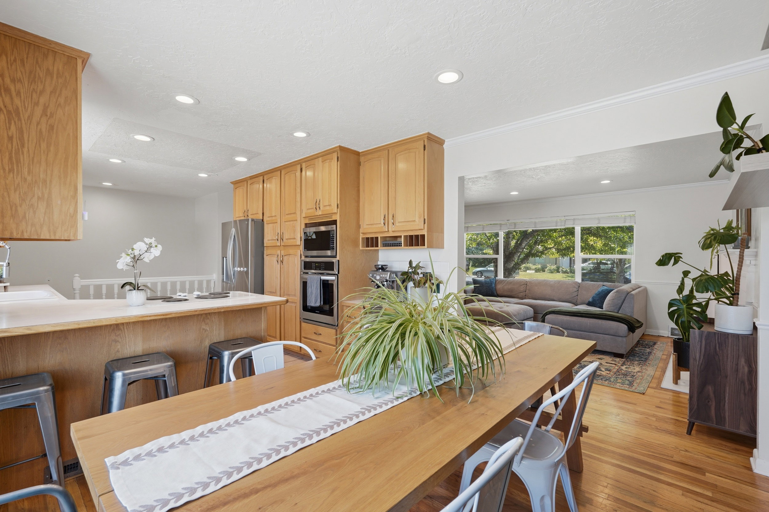Open-concept living space with hardwood flooring