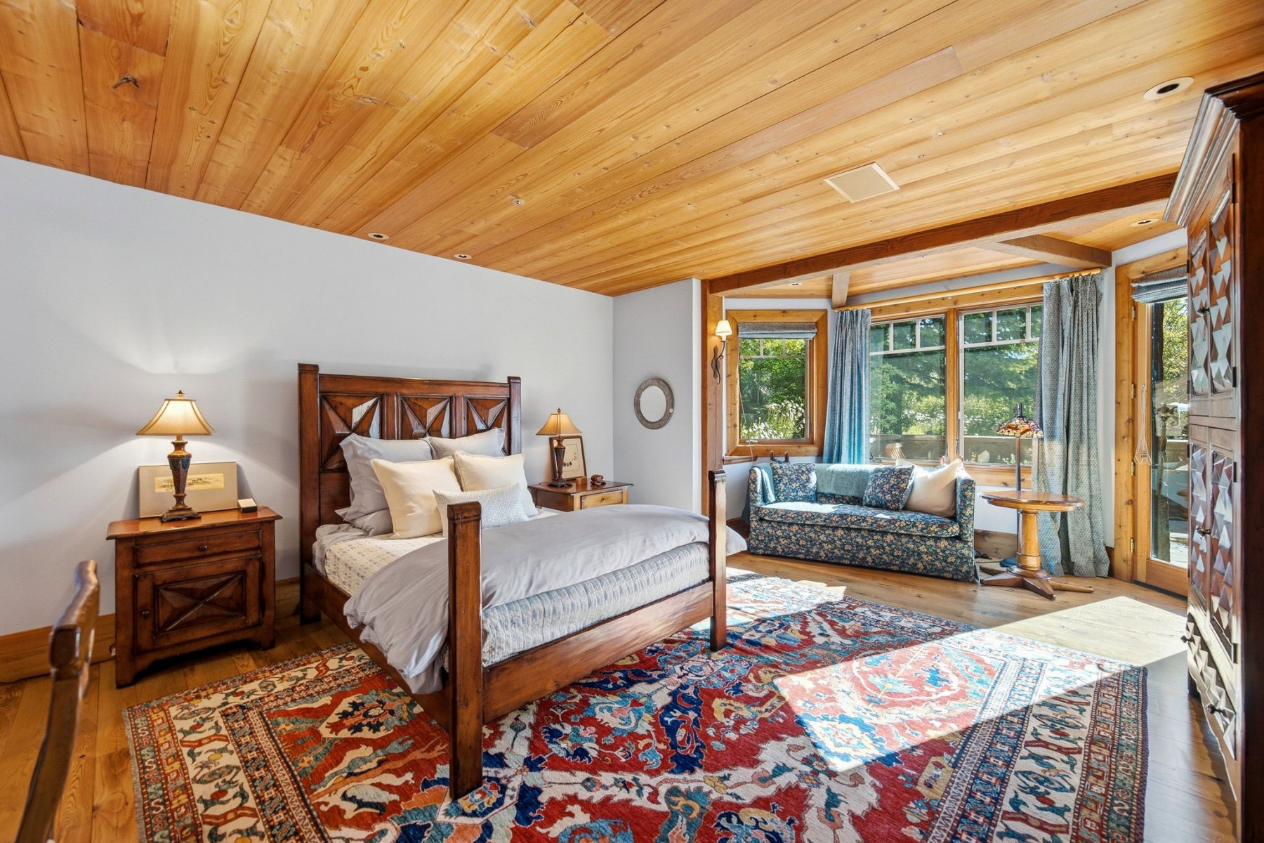 Wood-finish ceiling and flooring complement the light wall paint