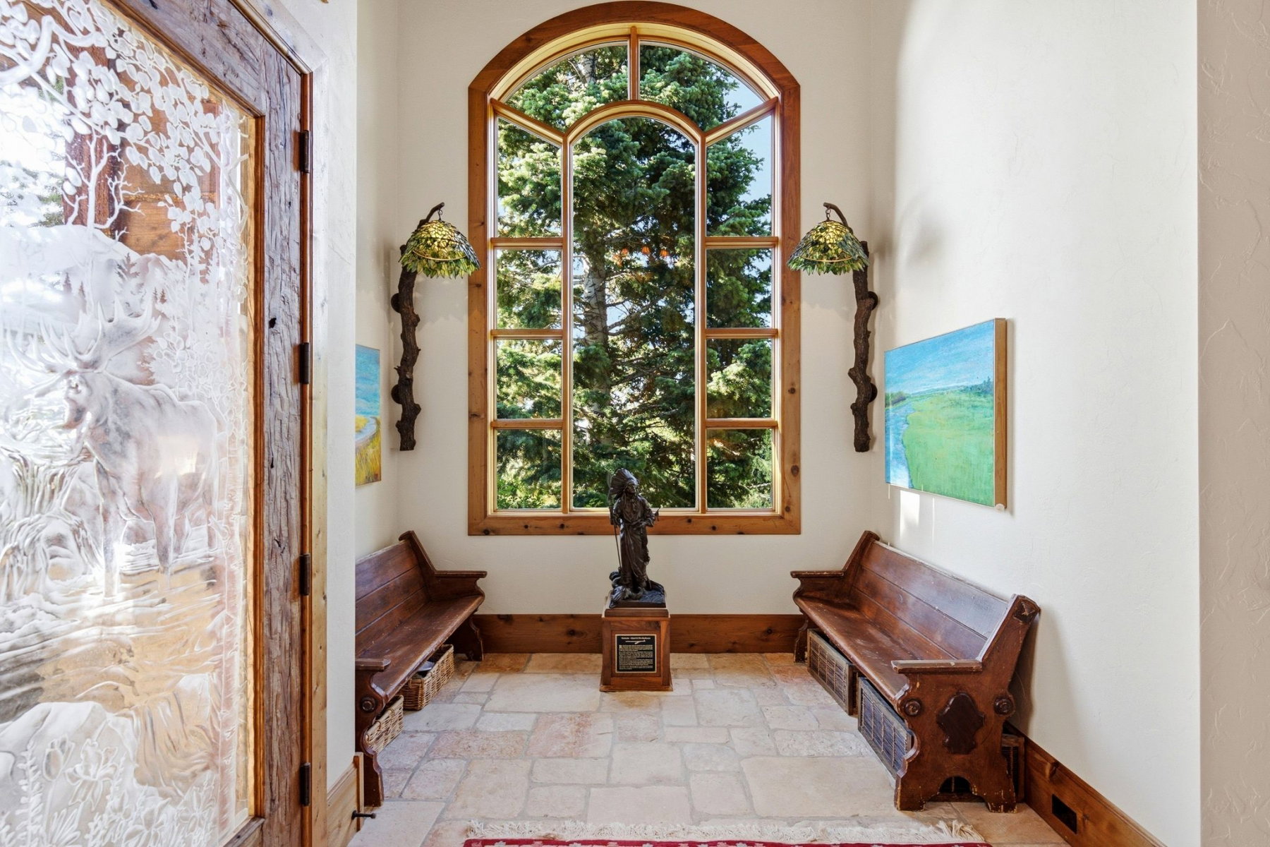 Arched picture window with wood-finish framing