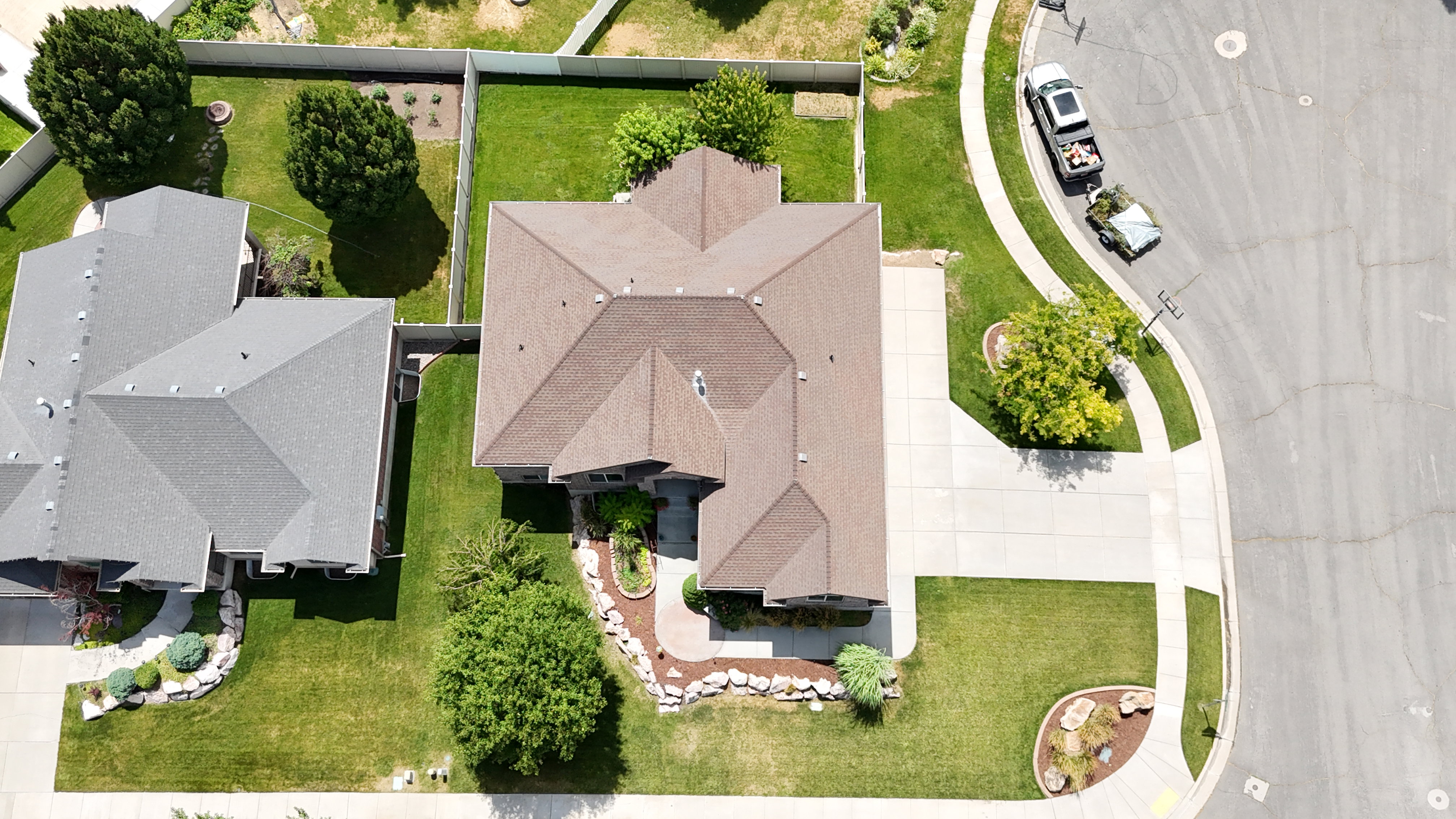 Brown shingle roofing with multiple gables