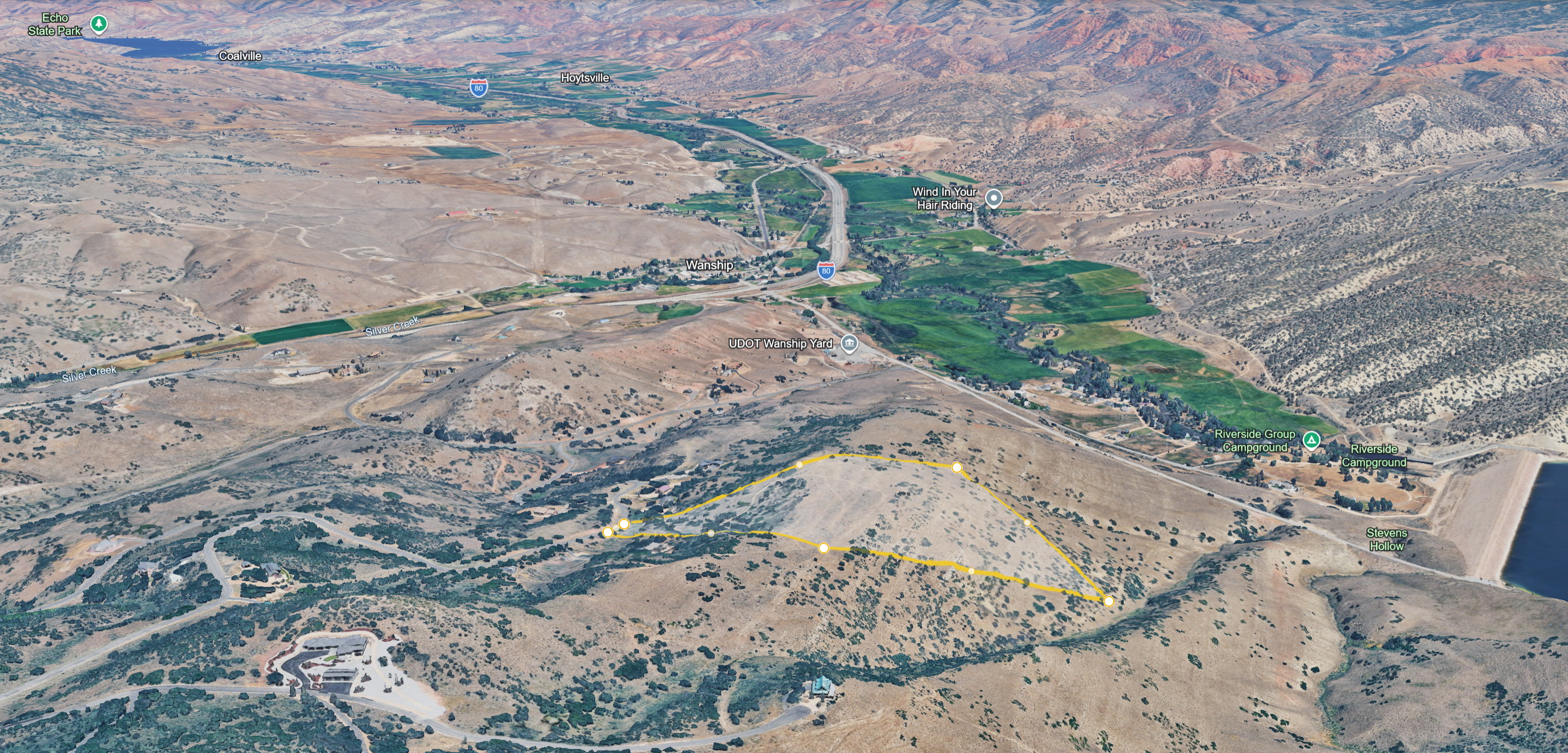 Expansive undeveloped hillside property offering a prominent location with direct access to a paved road