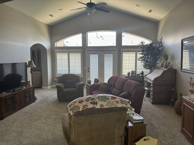 Vaulted ceiling featuring a ceiling fan and recessed lighting