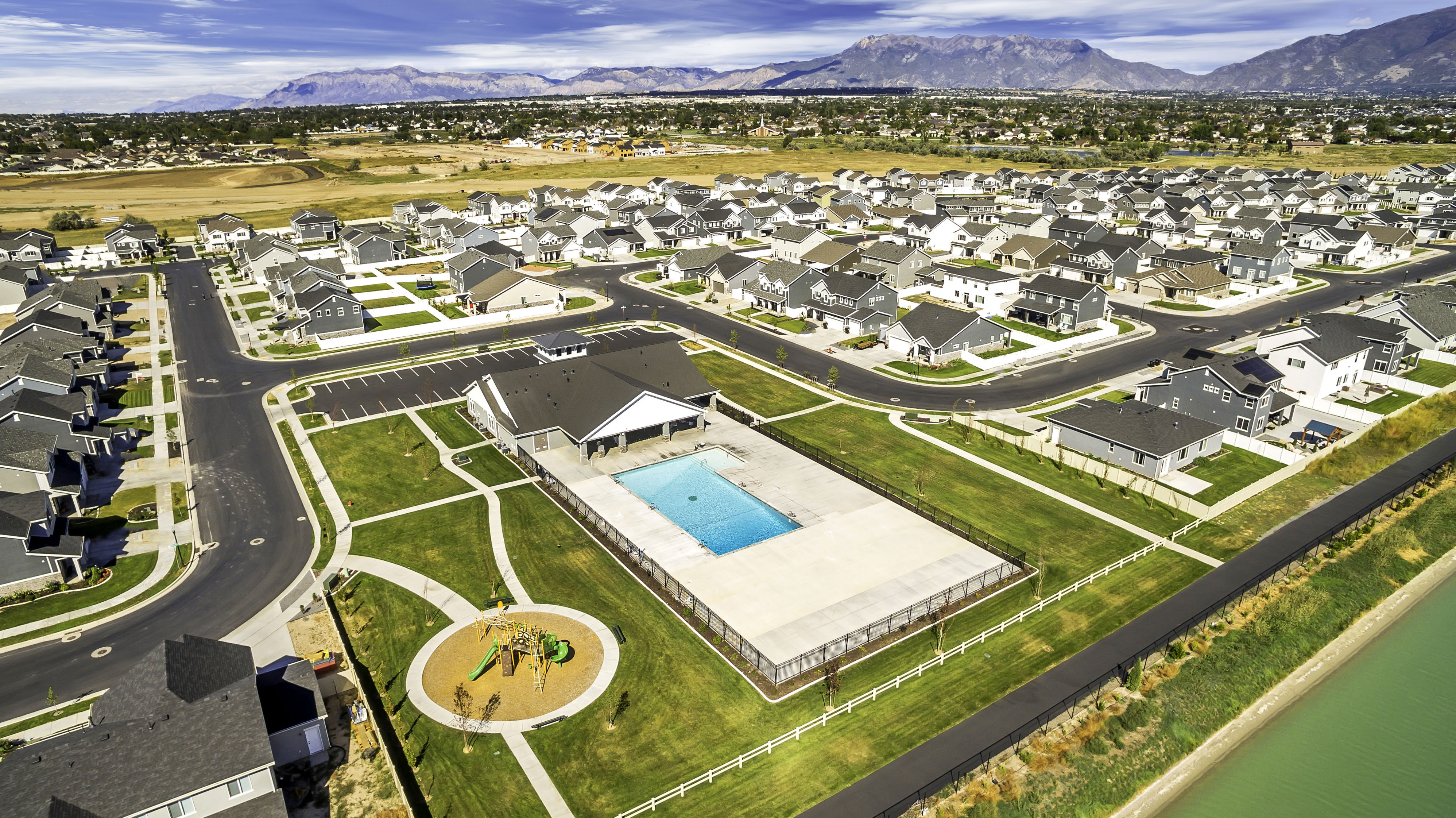 Community amenities featuring a swimming pool, clubhouse, and playground