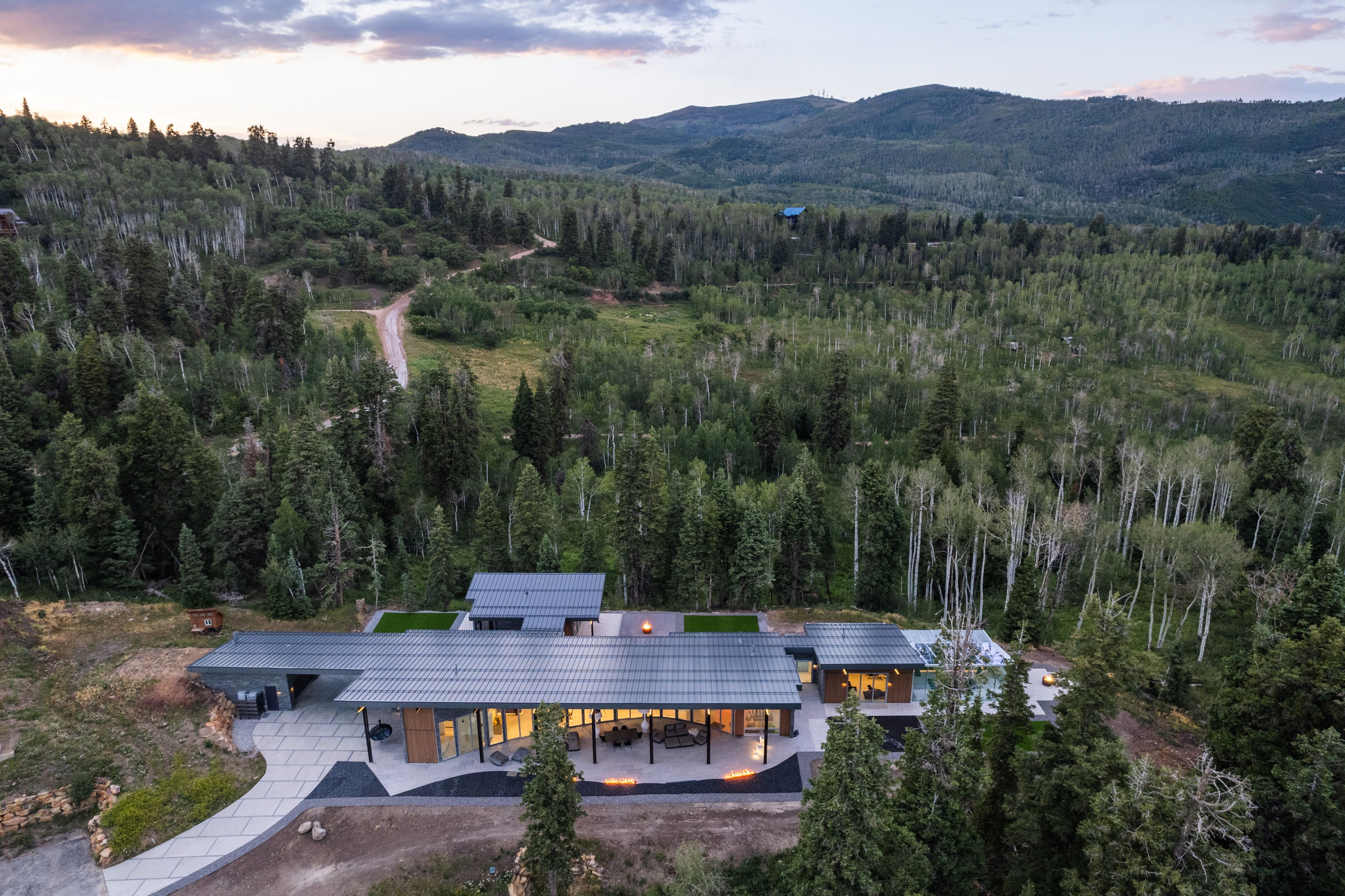 Modern architectural residence featuring extensive outdoor living space