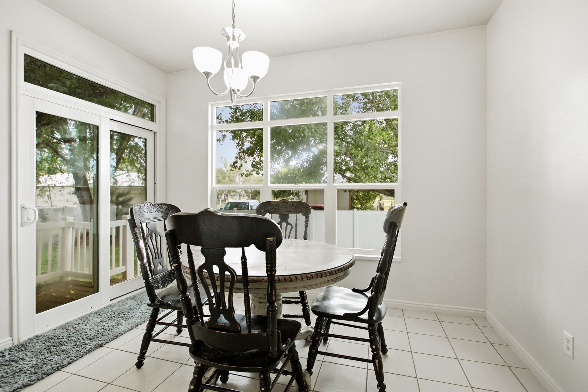 Bright interior featuring white tile flooring