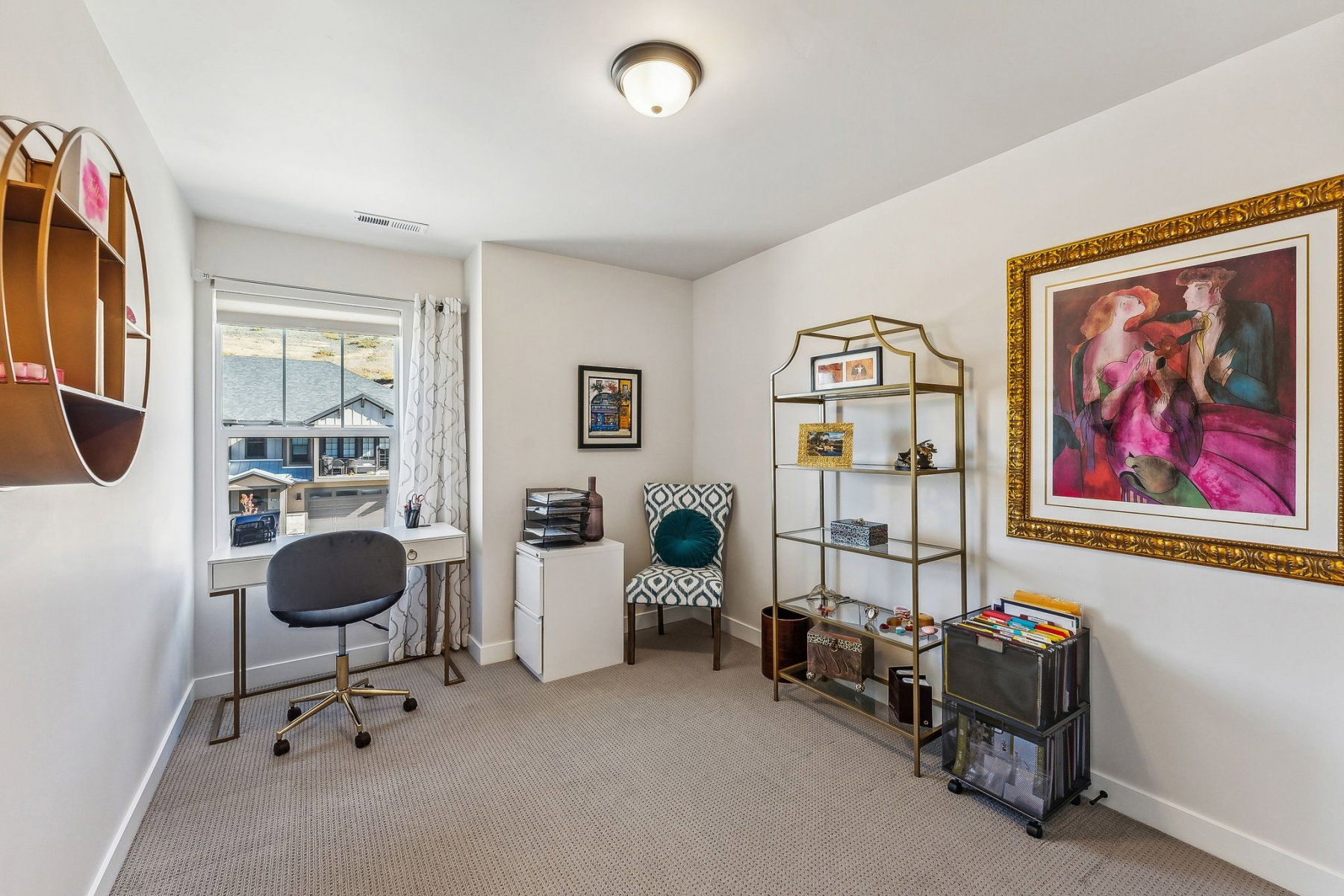 Carpeted room featuring a single window with white trim, a flush-mount ceiling light, and white walls