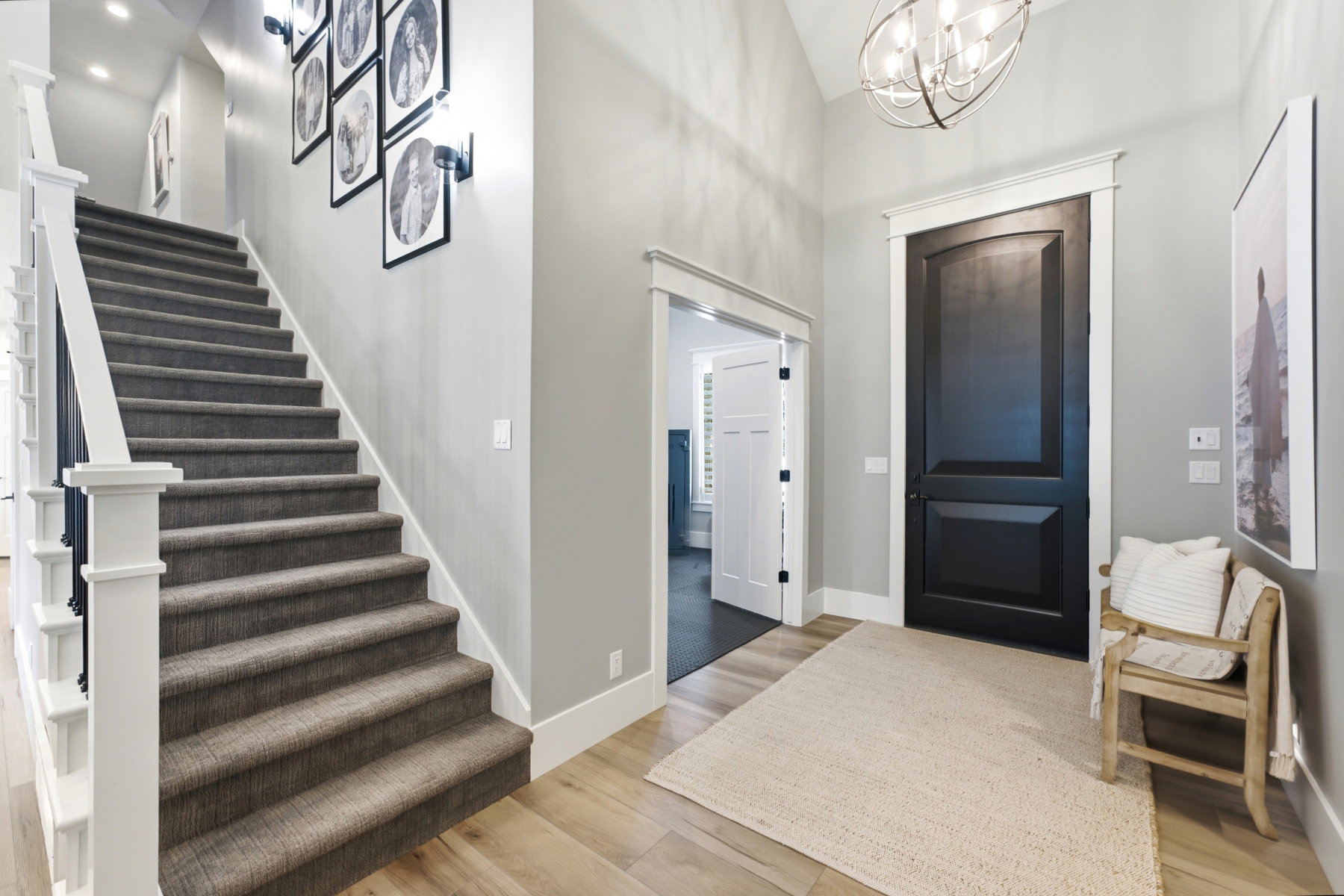 Entryway featuring high ceilings and light wood-finish flooring