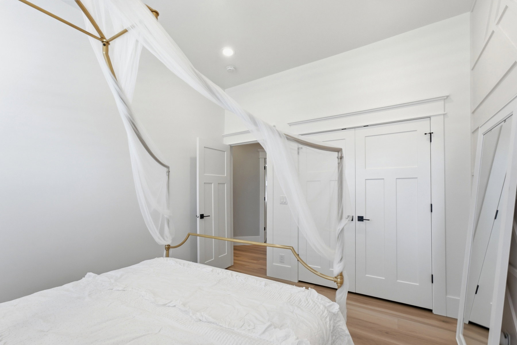 Bedroom featuring light wood-finish flooring