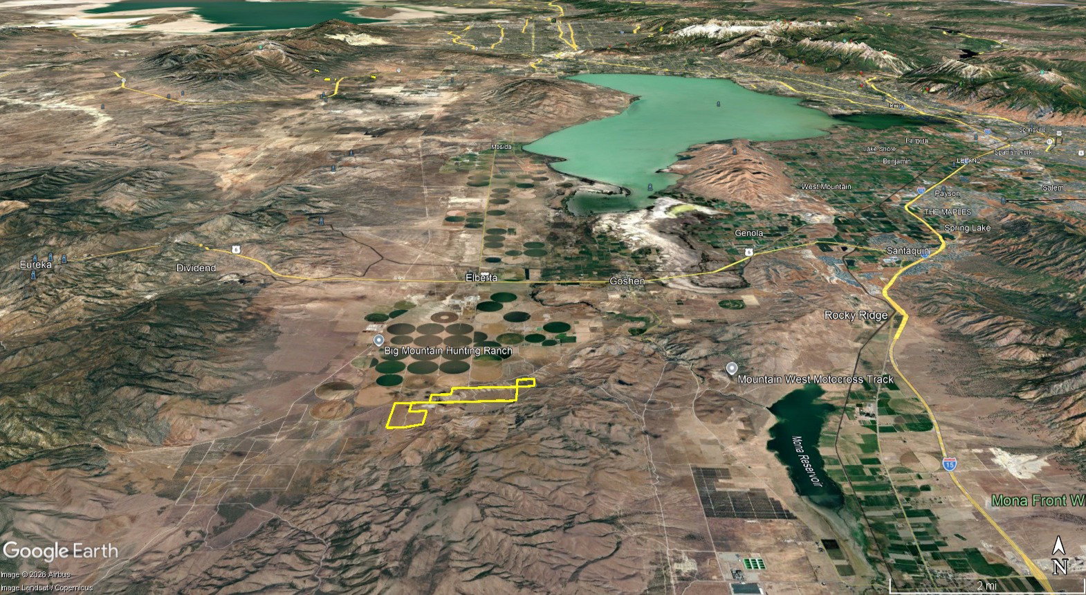 Aerial Map. Depicting the geographic area surrounding the property, including water bodies and agricultural zones