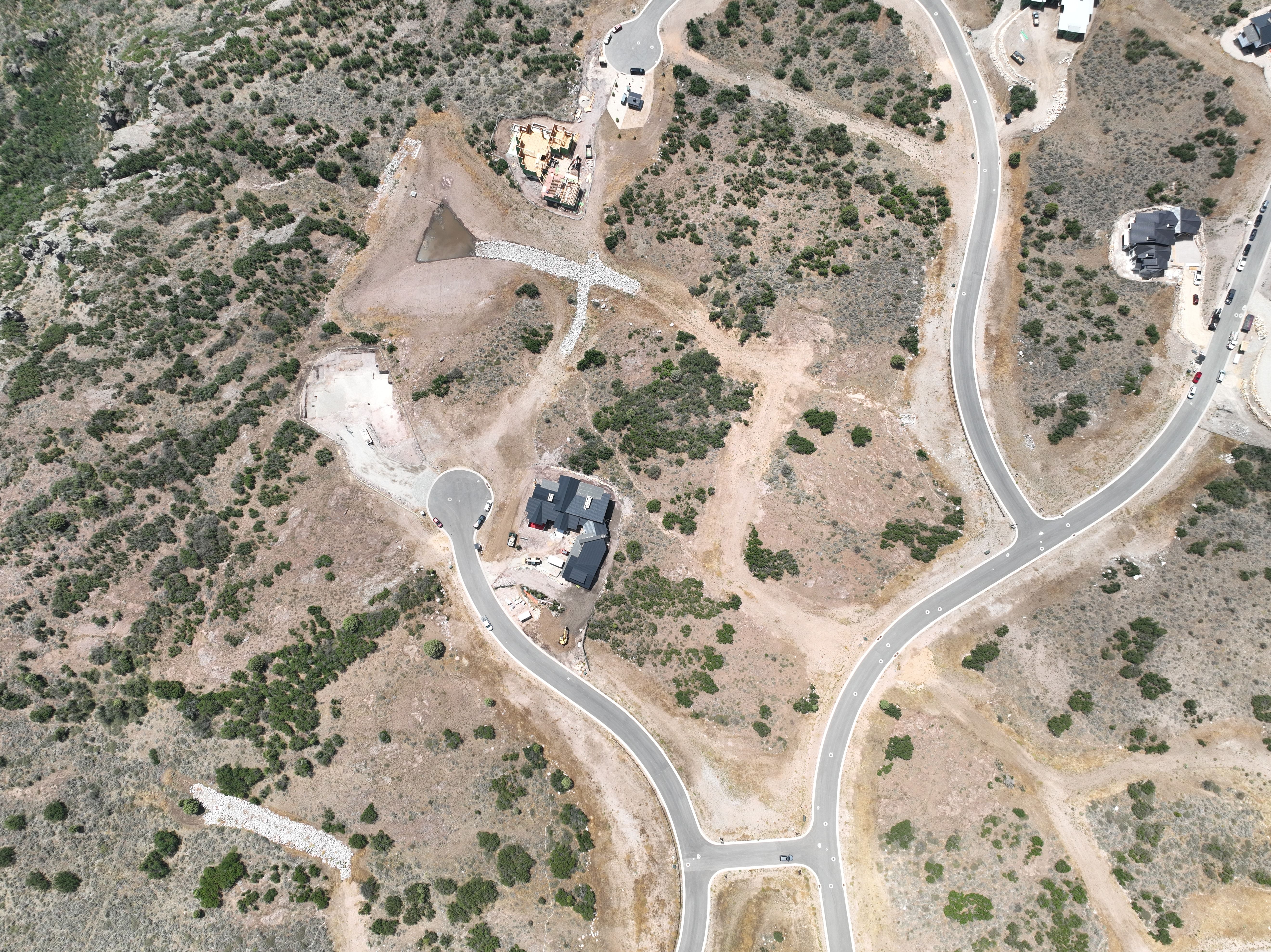 Aerial perspective showcasing a residential development with established roads