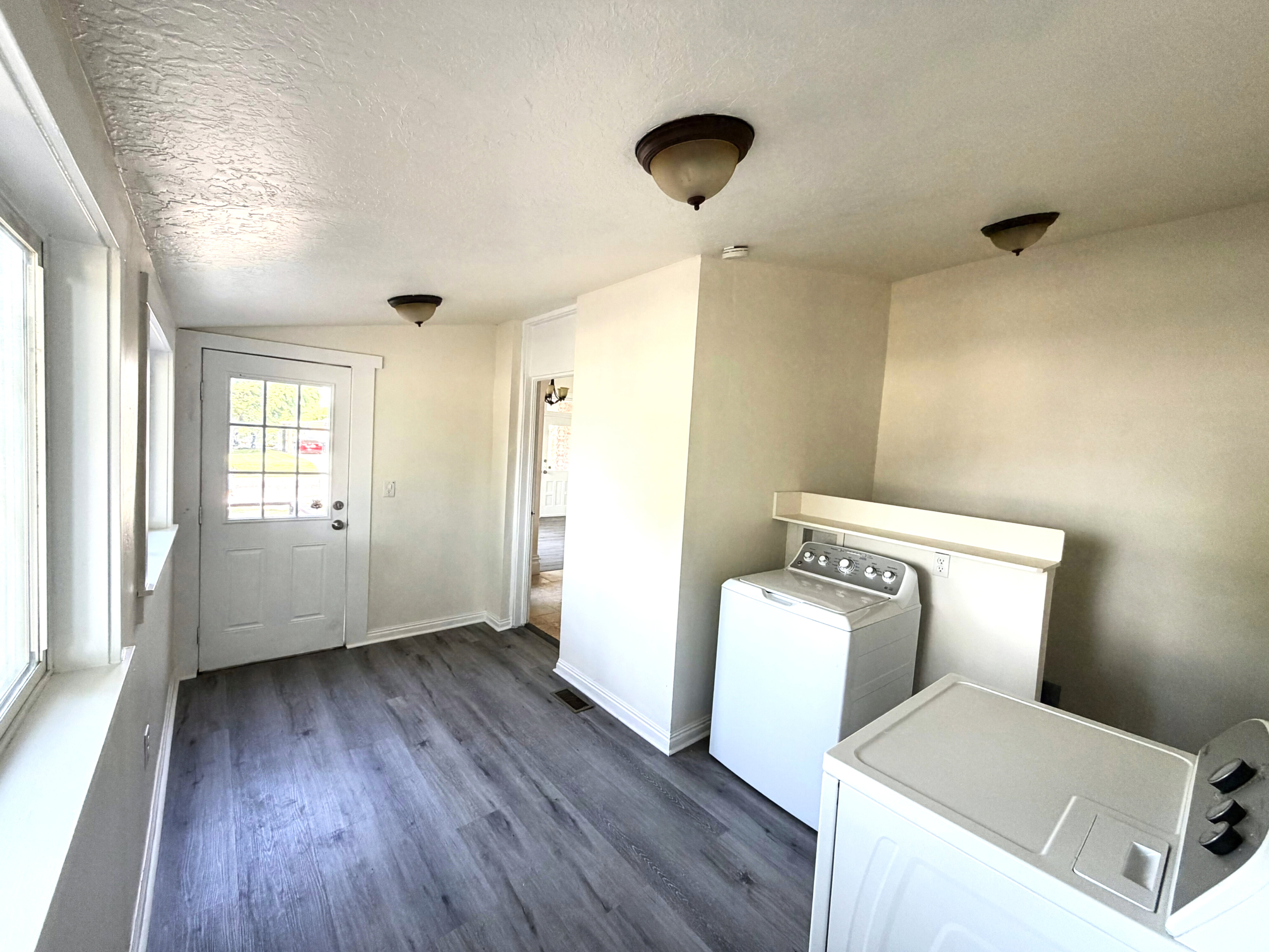Laundry Room with Mud Room space.  Cellar Entry.