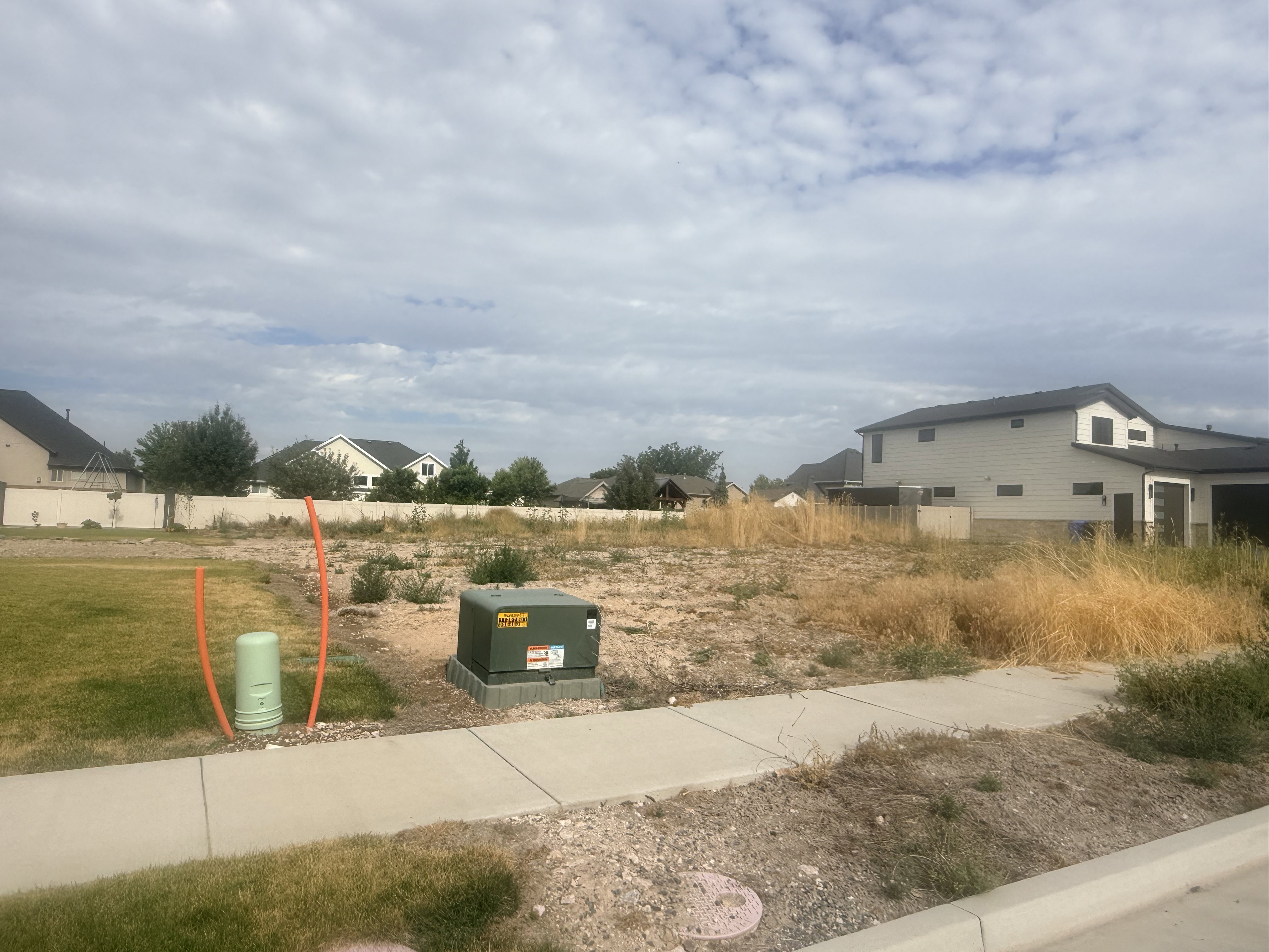Level lot with existing sidewalk infrastructure