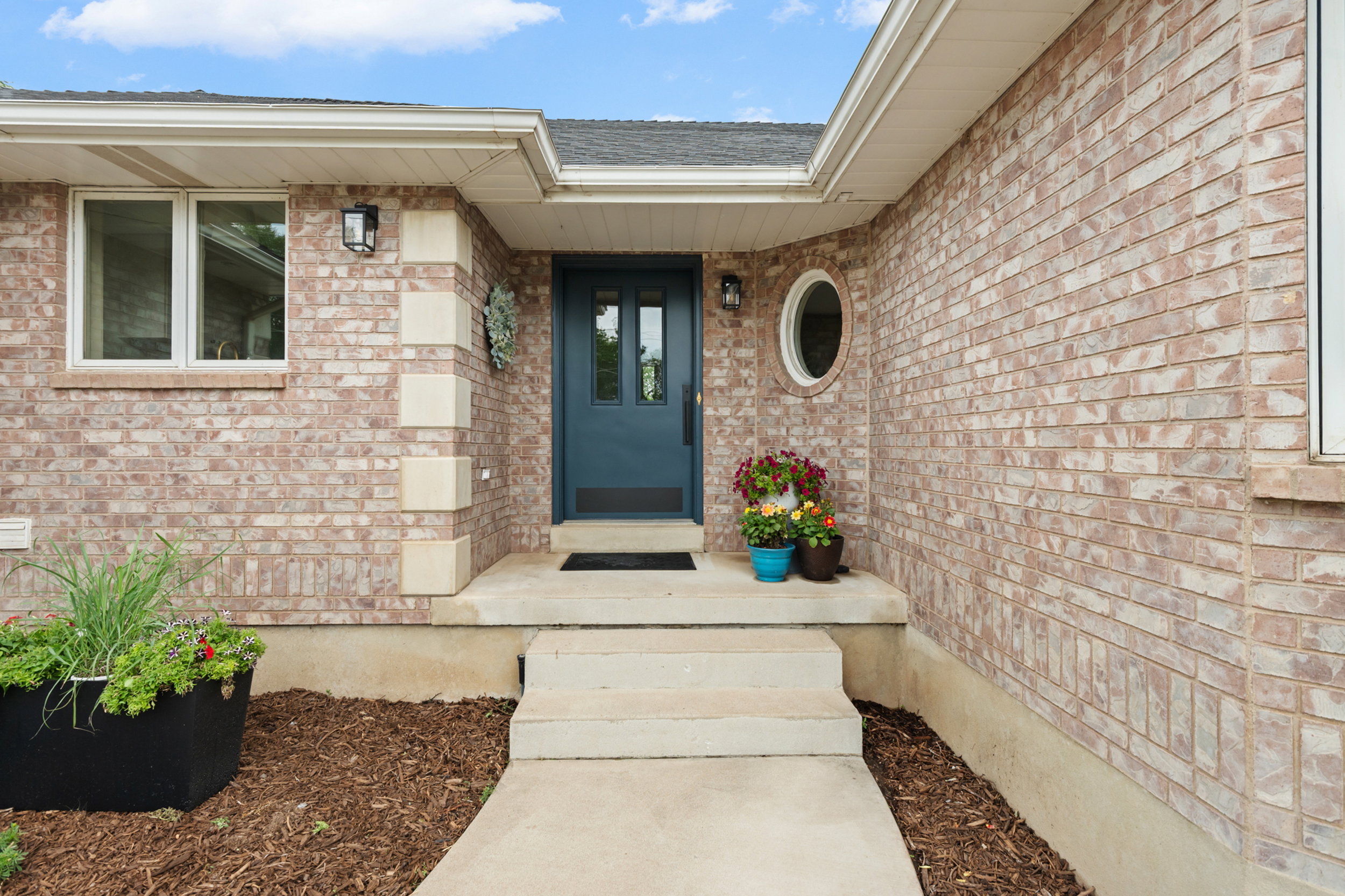 Brick exterior with contrasting stone accents
