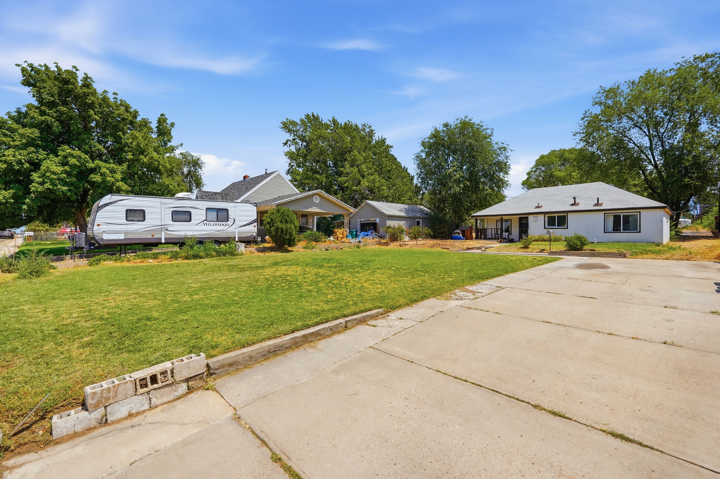 Expansive concrete driveway offering generous off-street parking