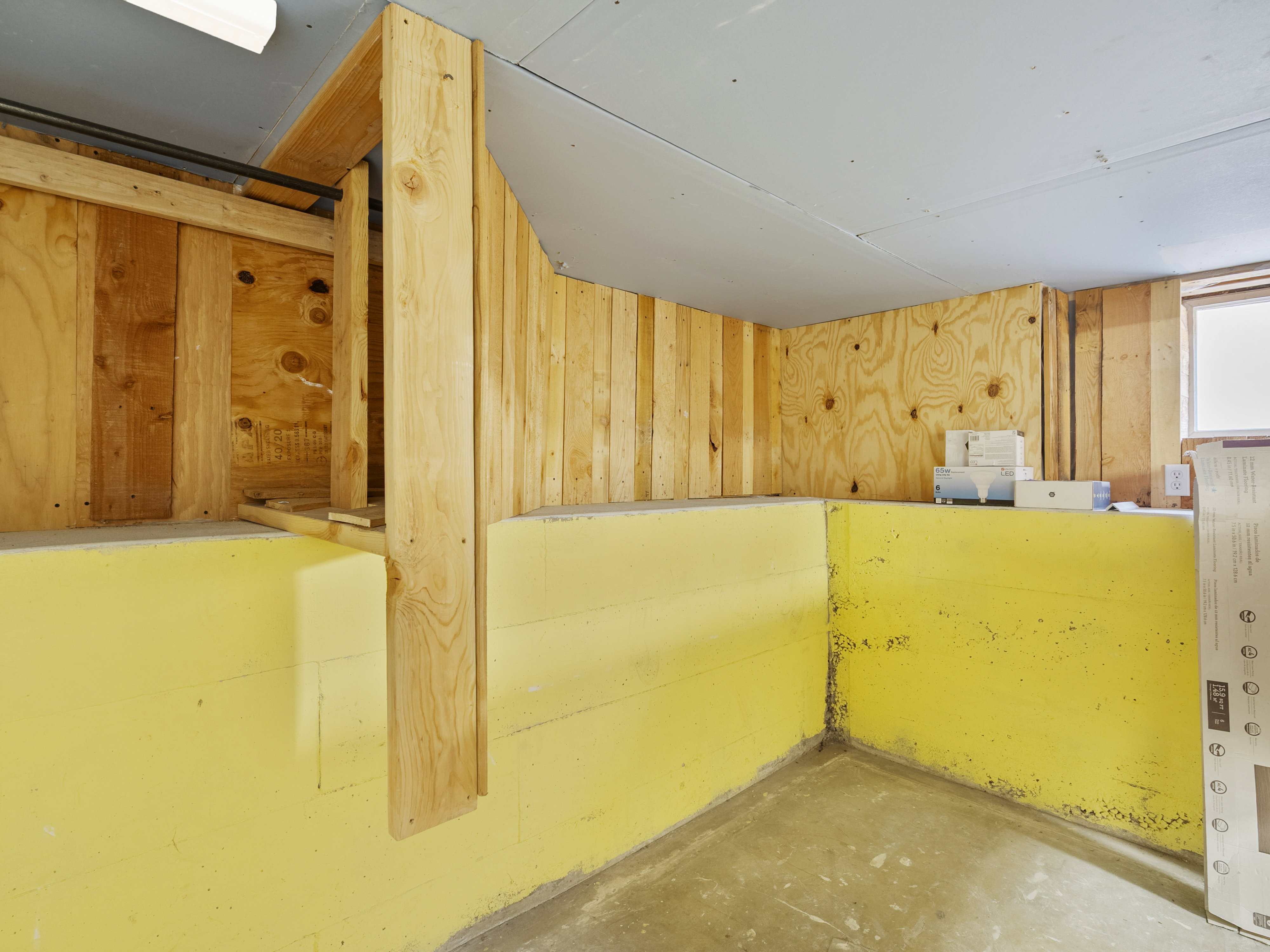 Unfinished basement bedroom closet.
