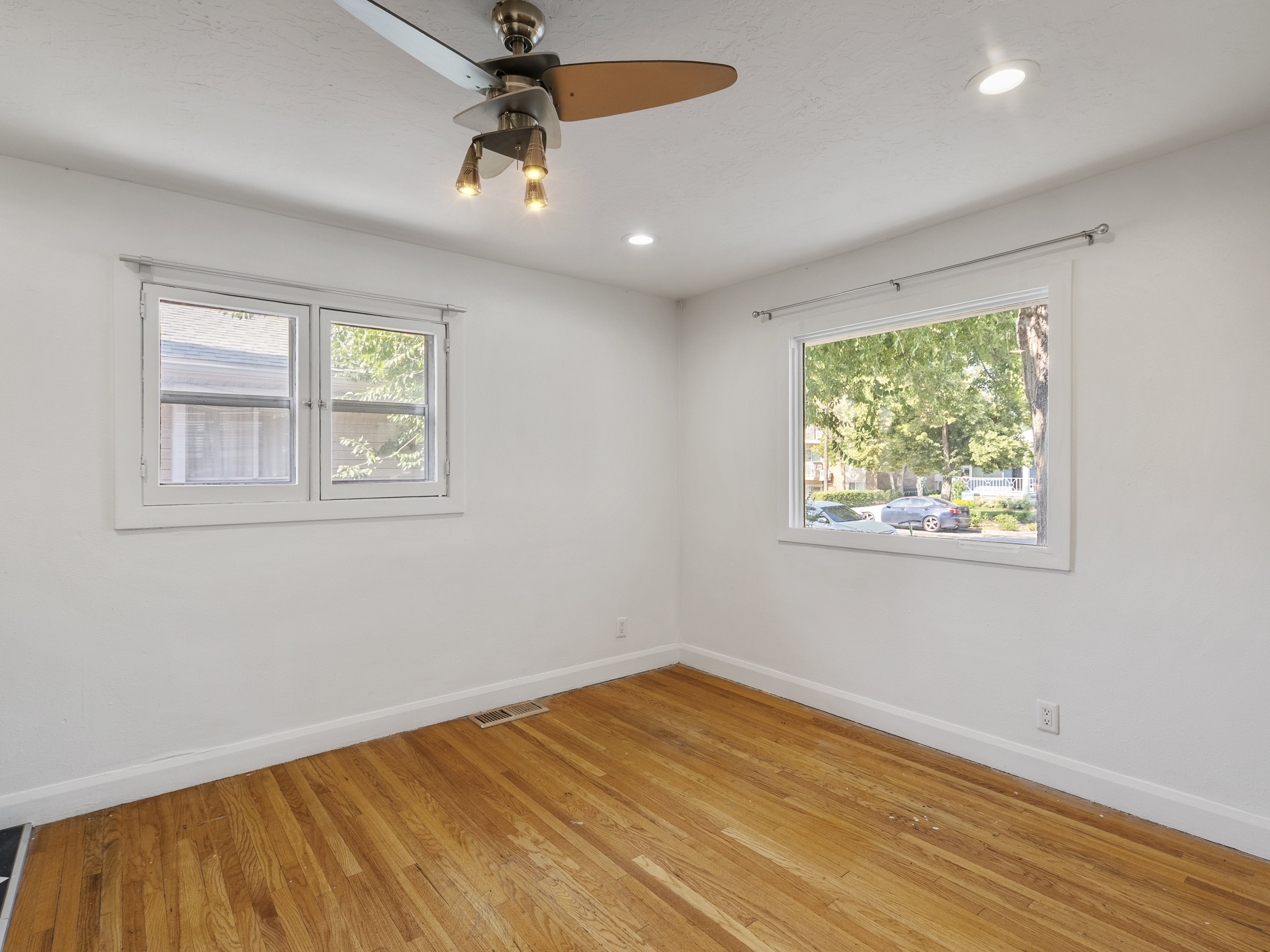 Hardwood flooring complemented by white walls