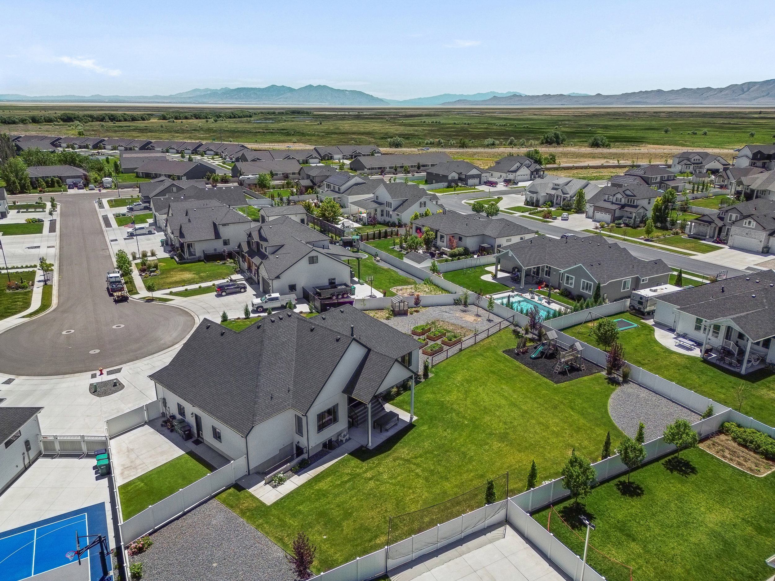 Expansive residential community featuring diverse home styles and well-maintained green spaces