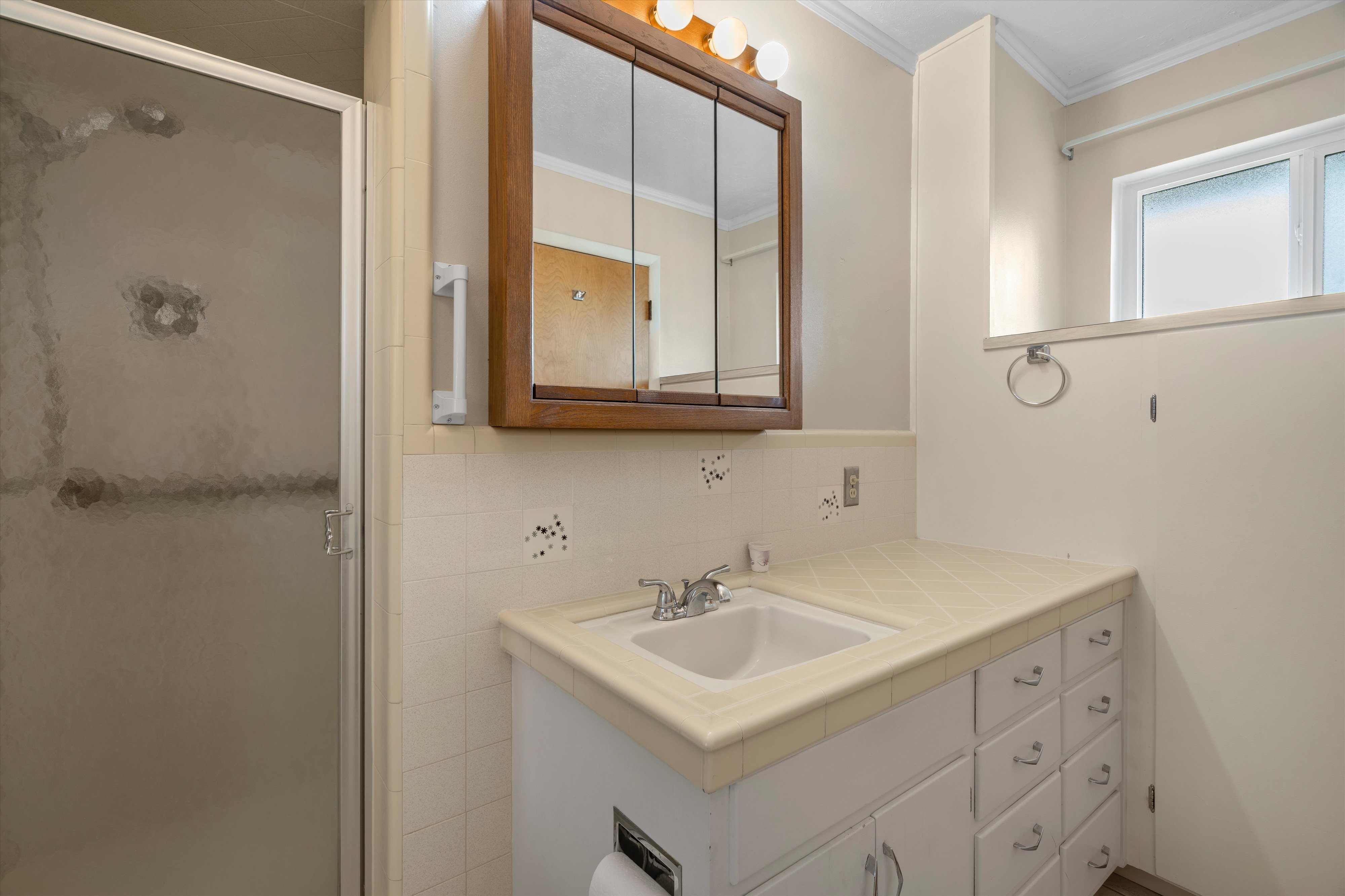Large hall Bathroom with separate tub and shower.