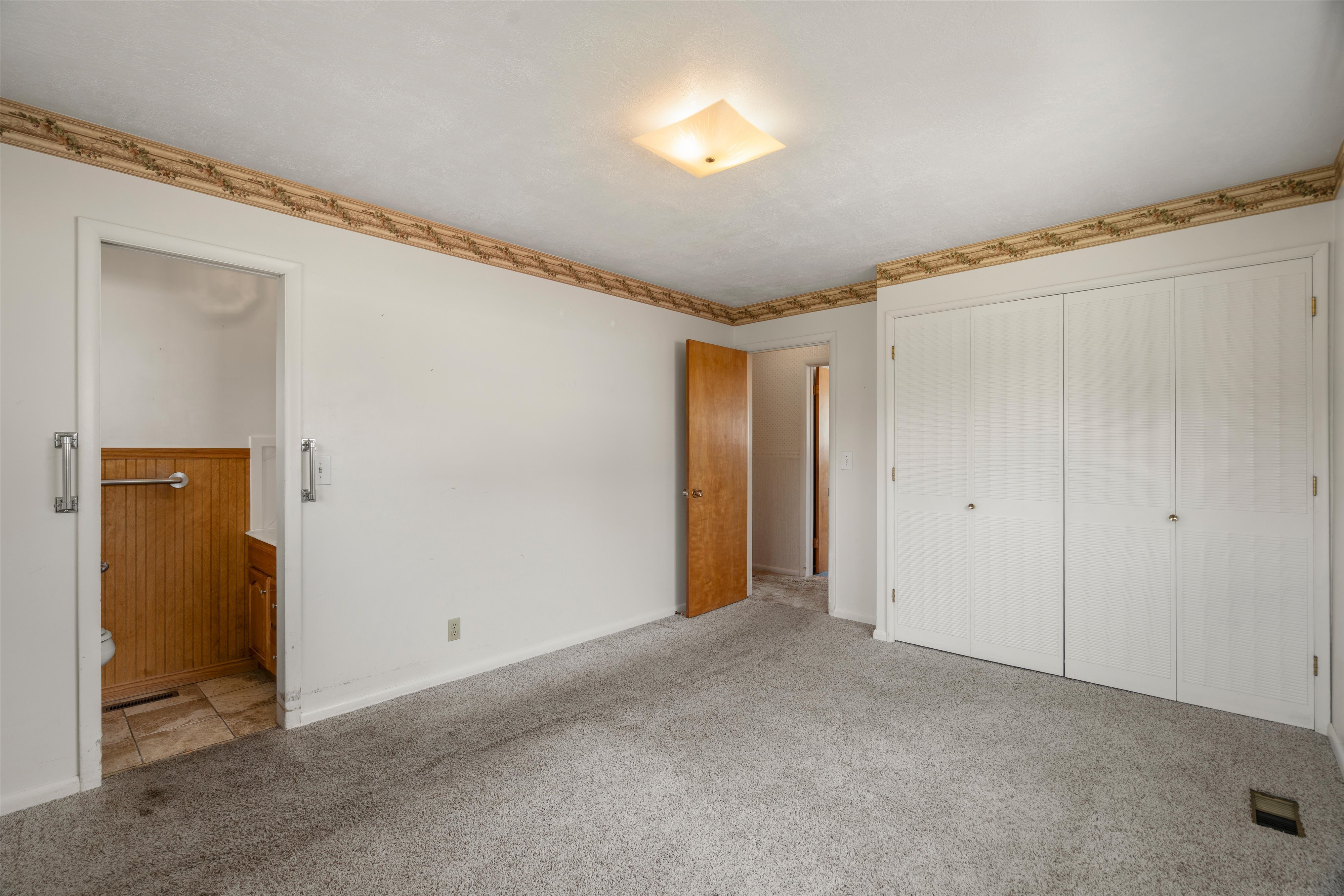 Primary Bedroom with half Bath