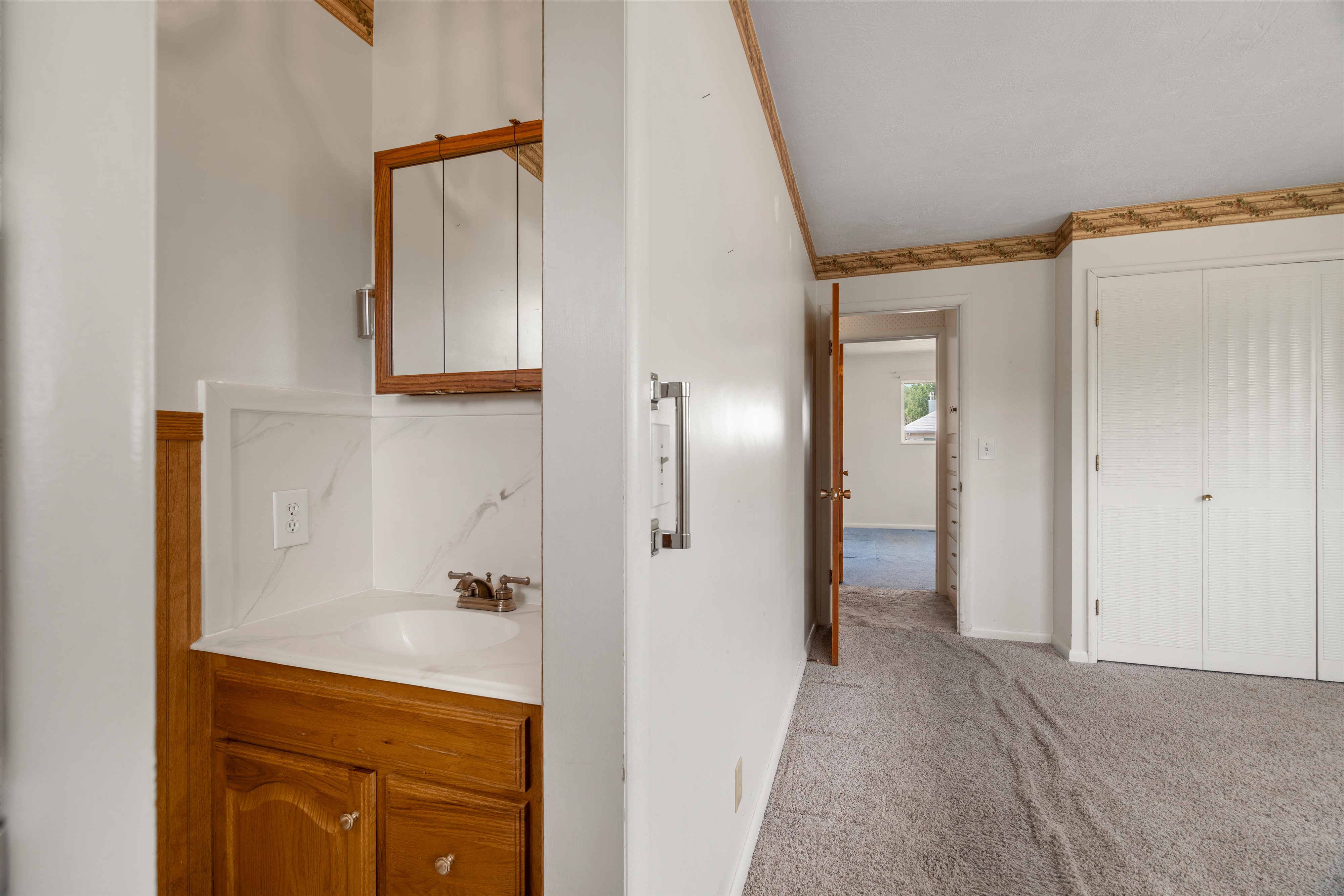 Primary Bedroom with half Bath