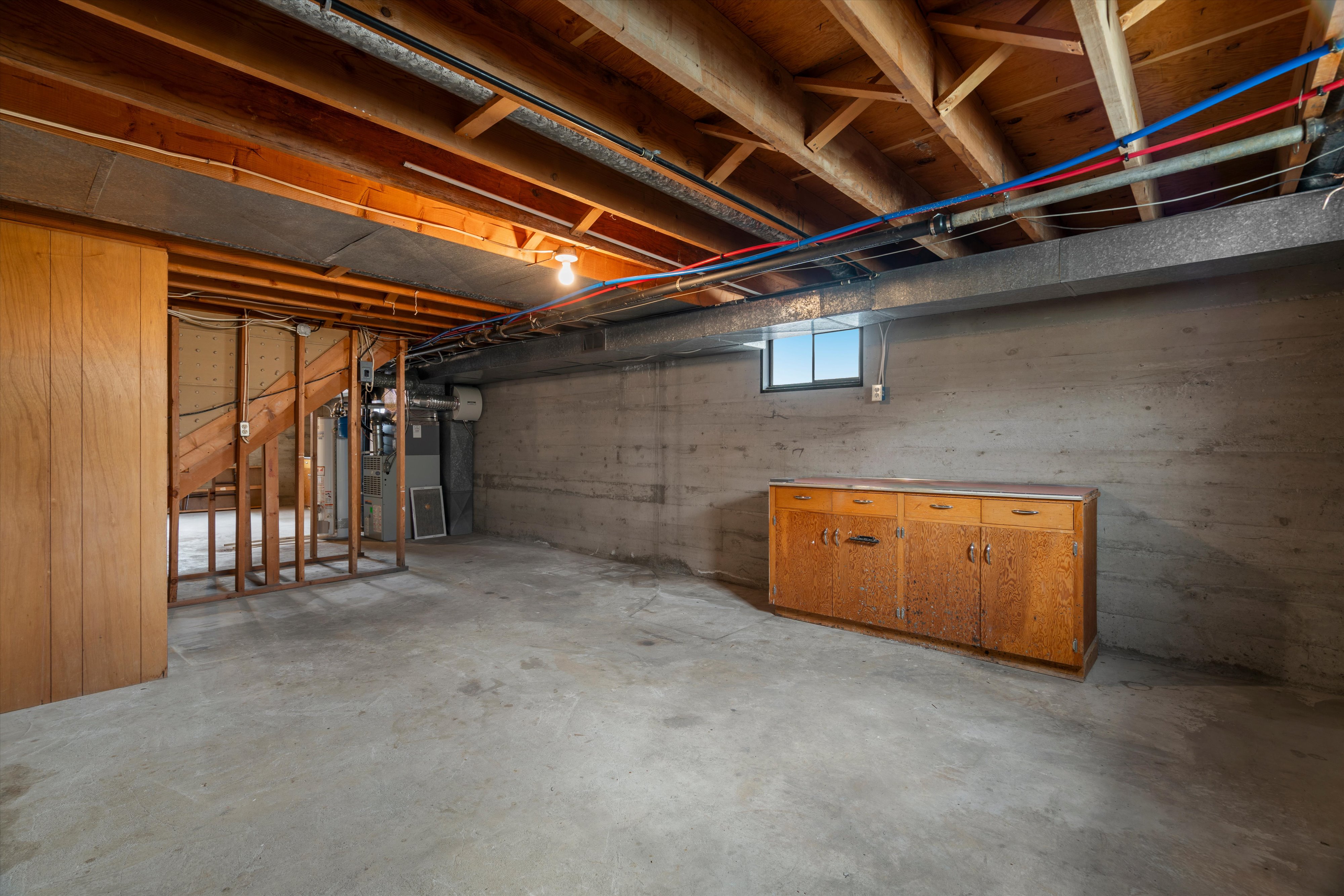 Storage/unfinished basement.