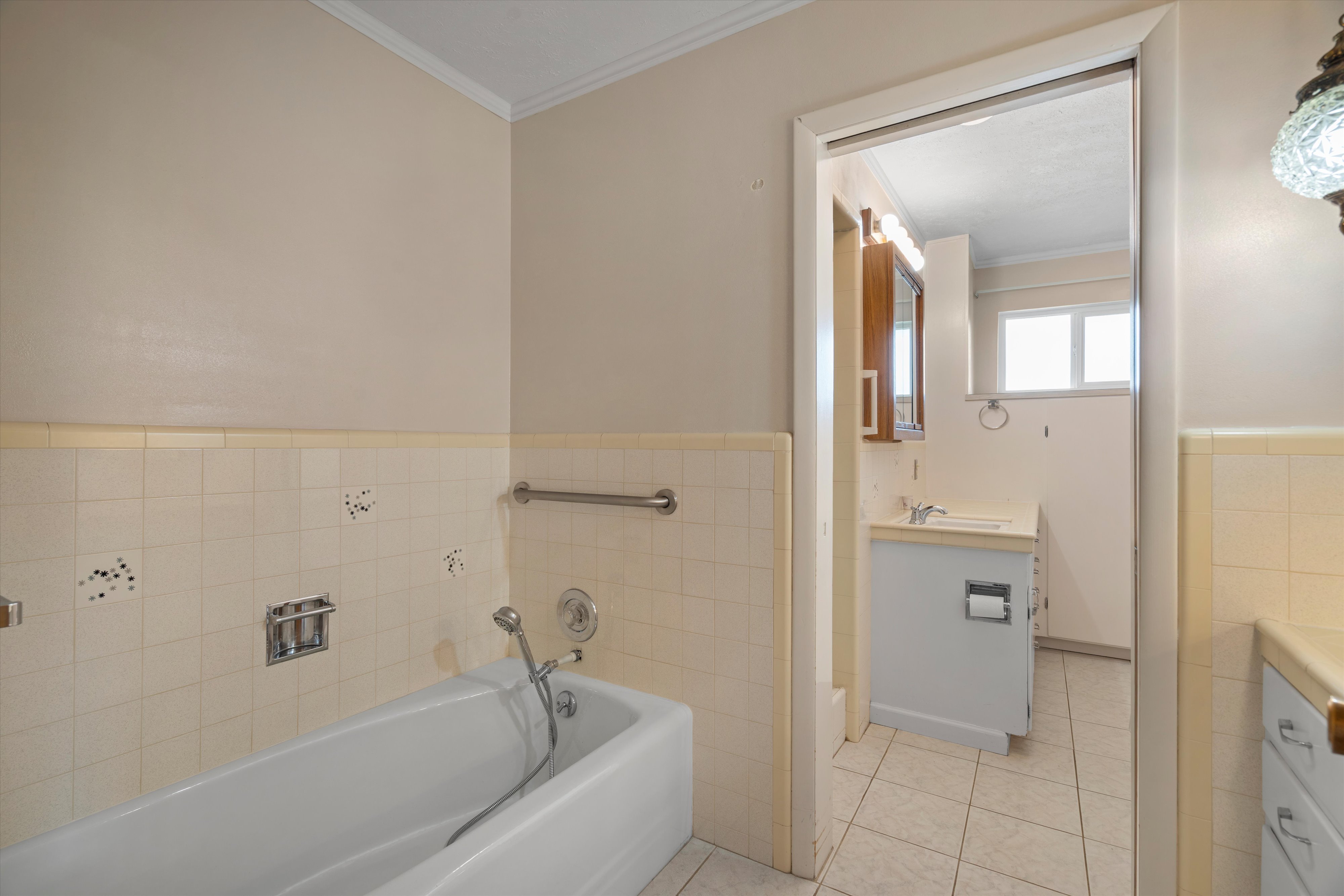 Large hall Bathroom with separate tub and shower.