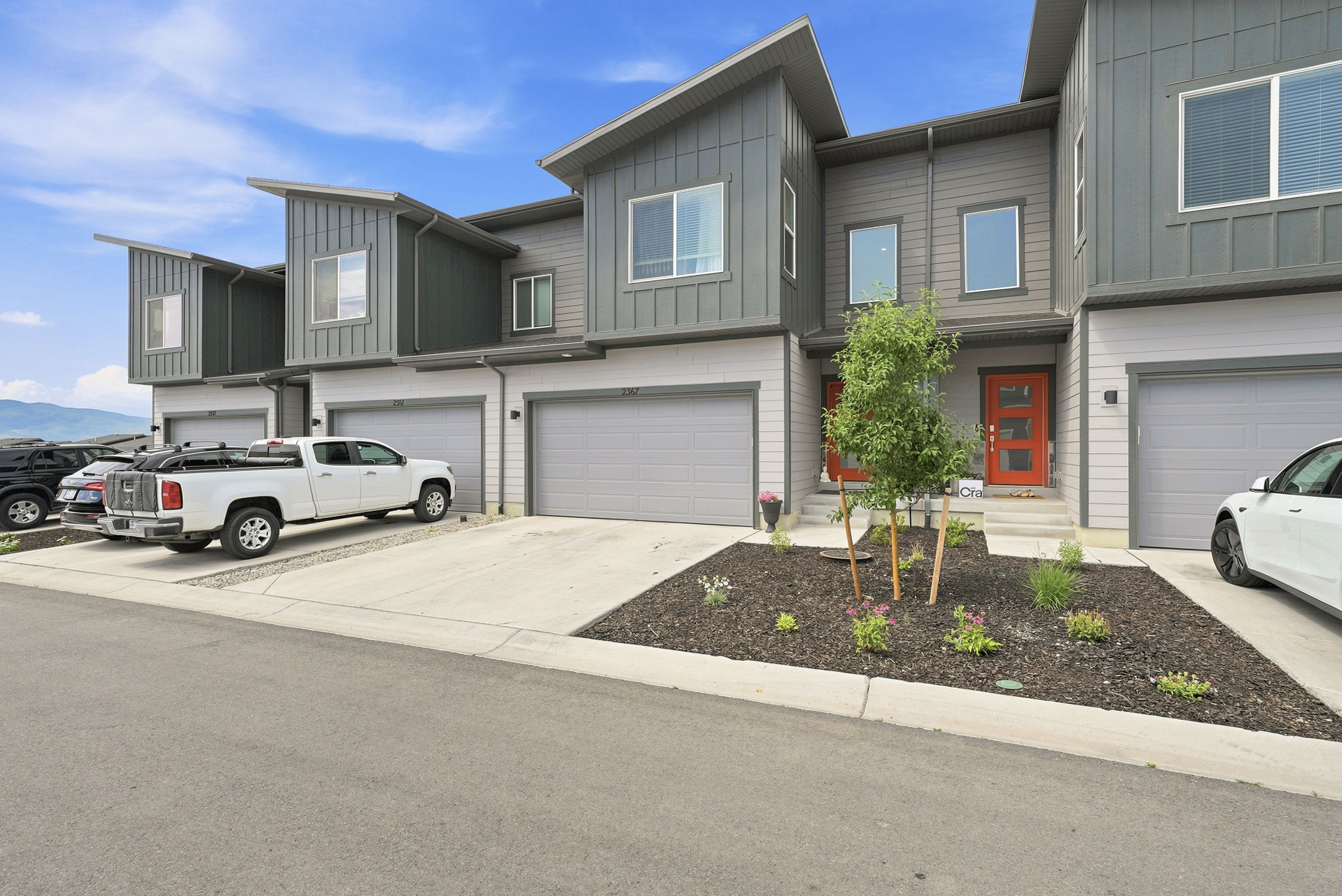 Modern townhome exterior featuring contemporary architectural design elements