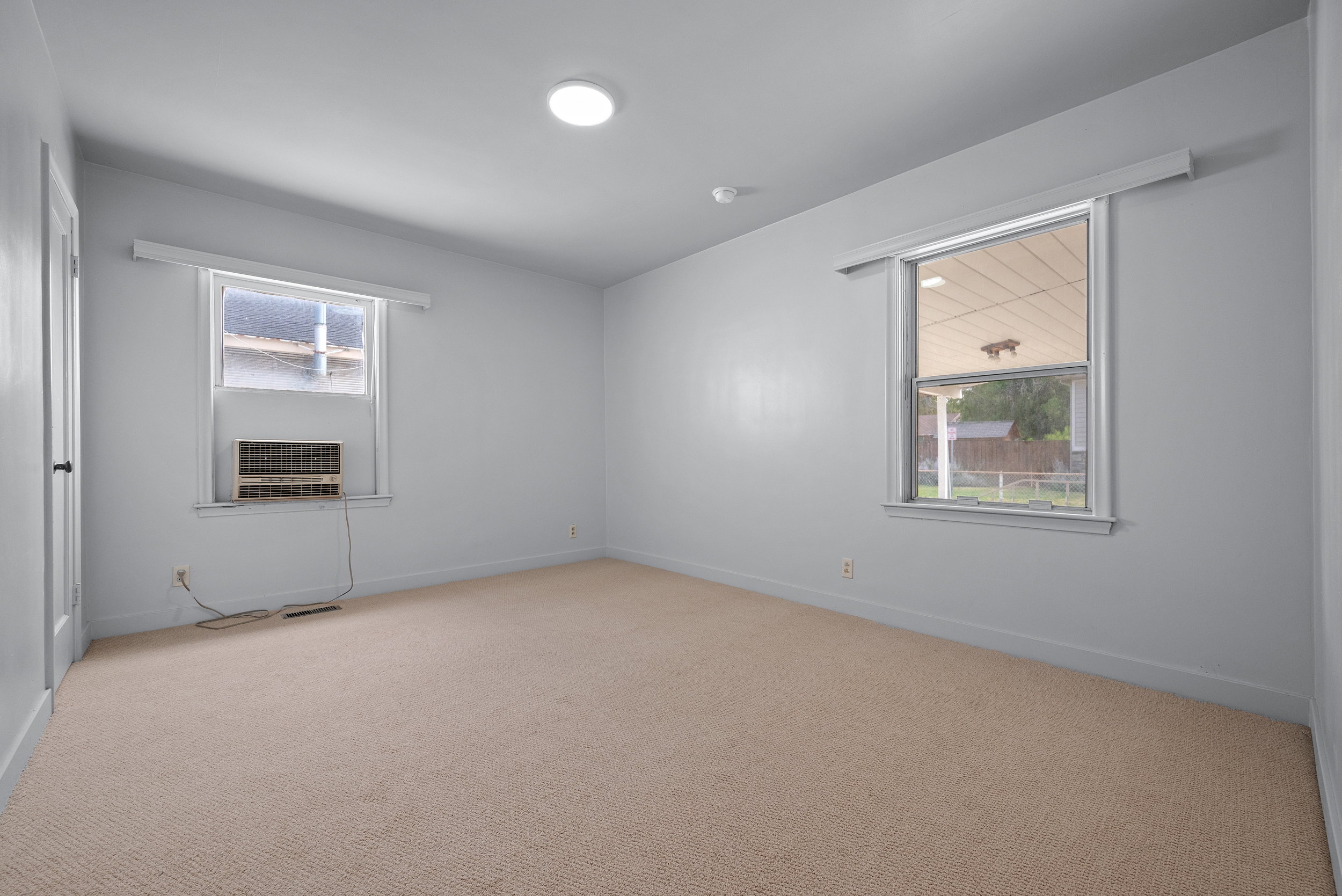 Bedroom #2. New paint and carpet.
