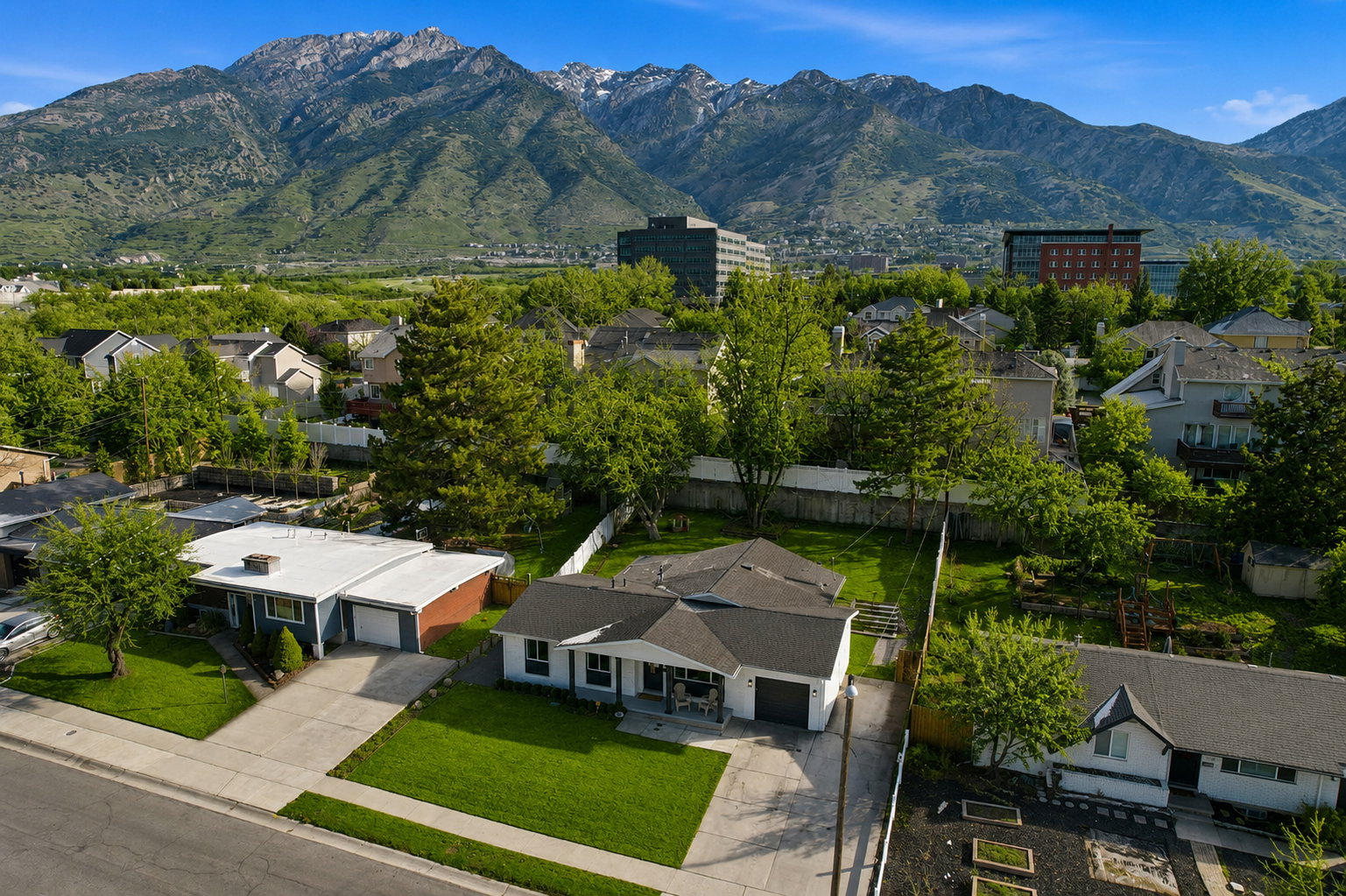 Single-story residence with an attached garage and a concrete driveway