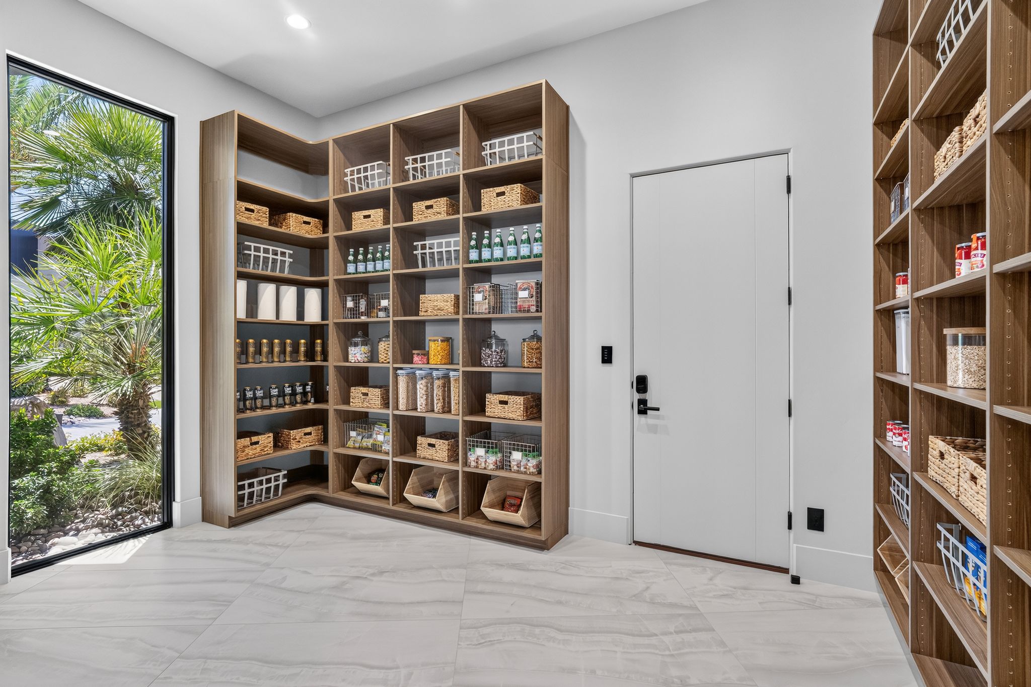 Custom shelving system with wood-finish construction, providing extensive storage