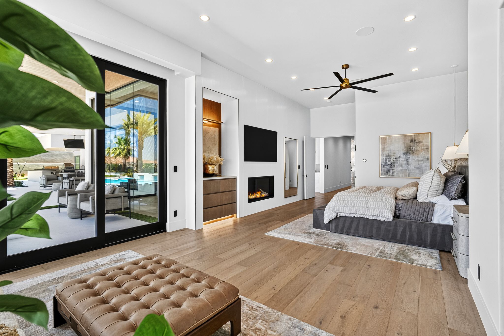 Bedroom featuring wood-finish flooring, recessed lighting, and a contemporary ceiling fan