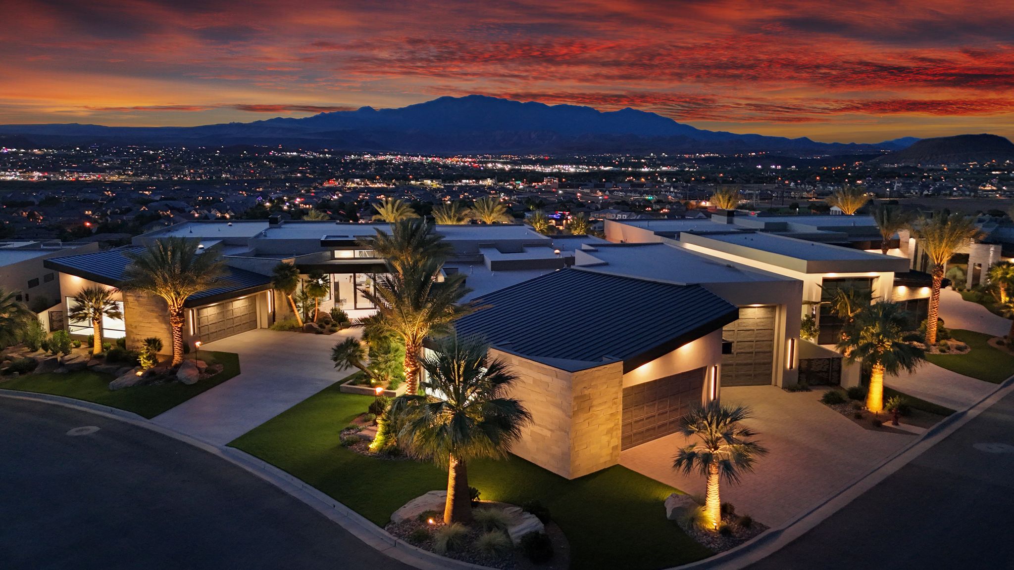 Modern architectural style residence featuring a dark-toned roofline and large windows