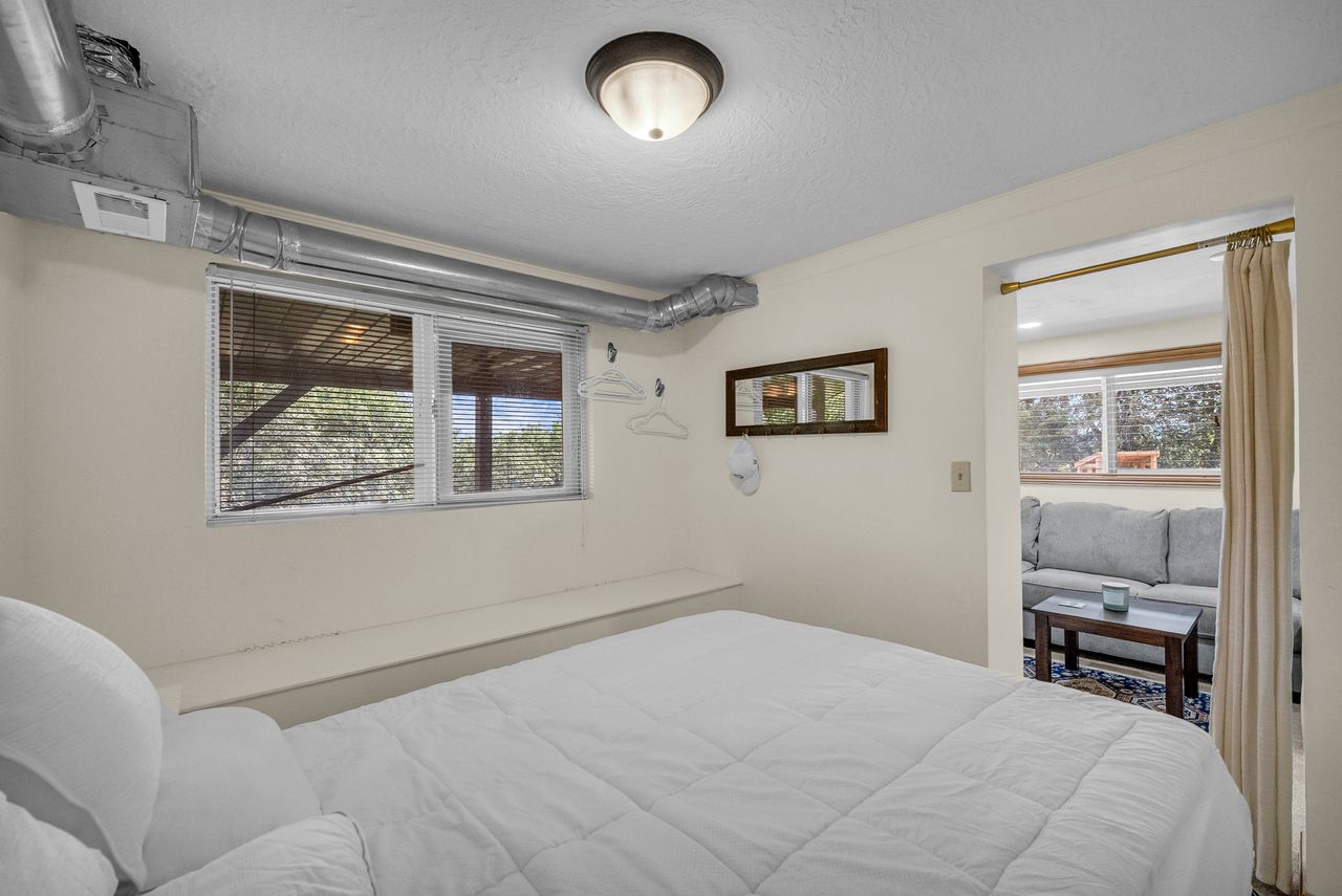 Interior room with painted walls and exposed ductwork