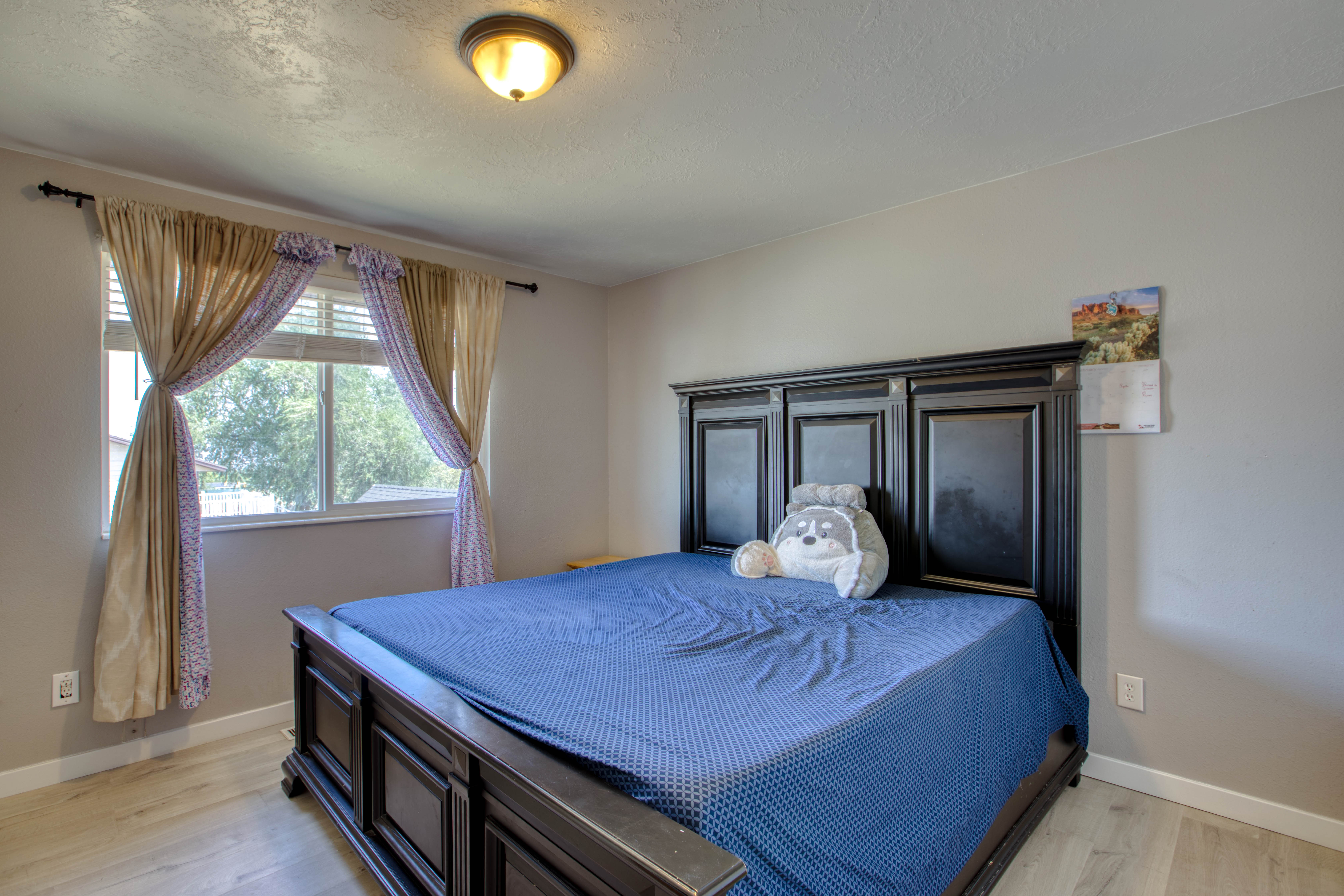 Interior space with light gray wall paint and light wood-finish flooring