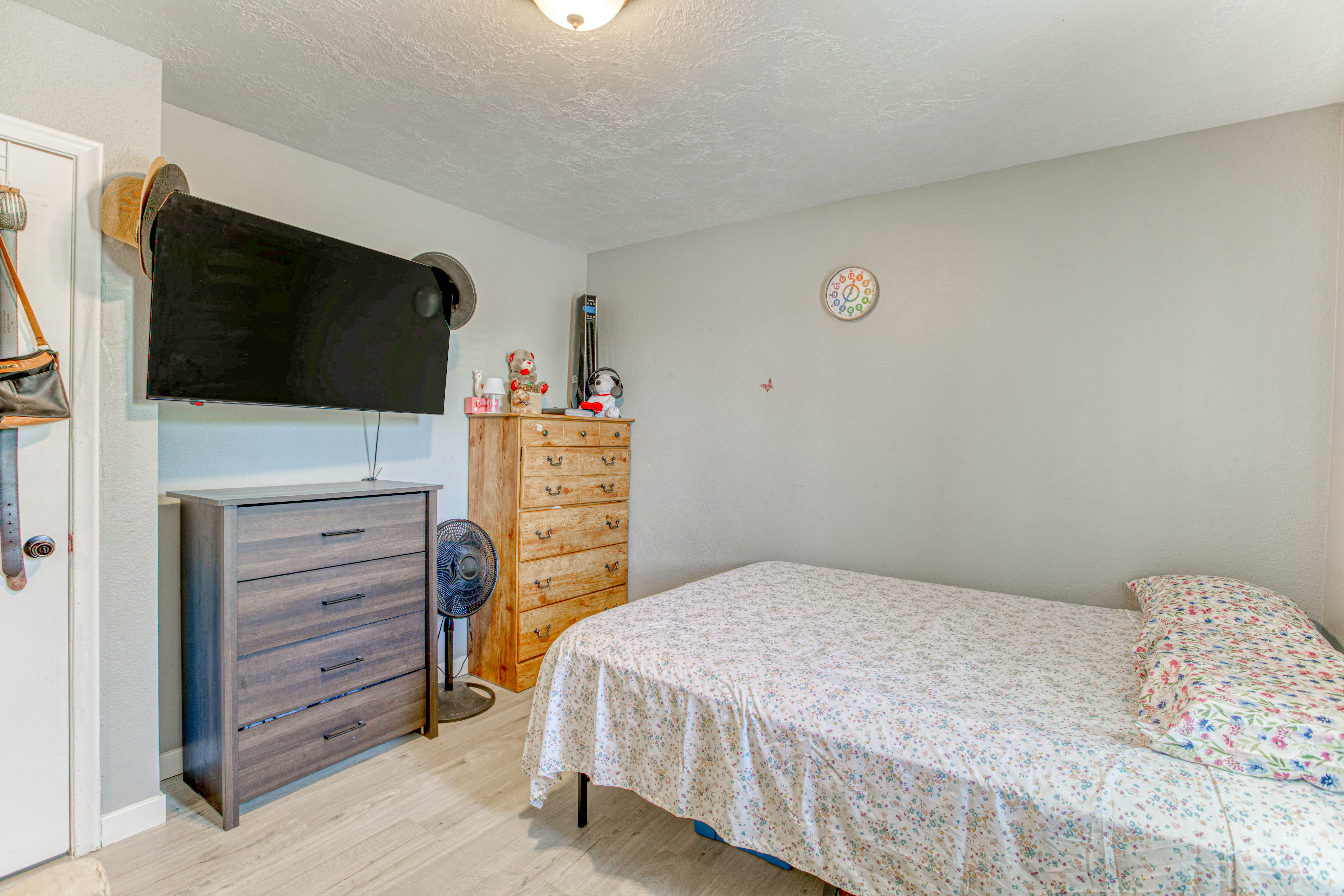 Neutral wall colors with wood-finish flooring