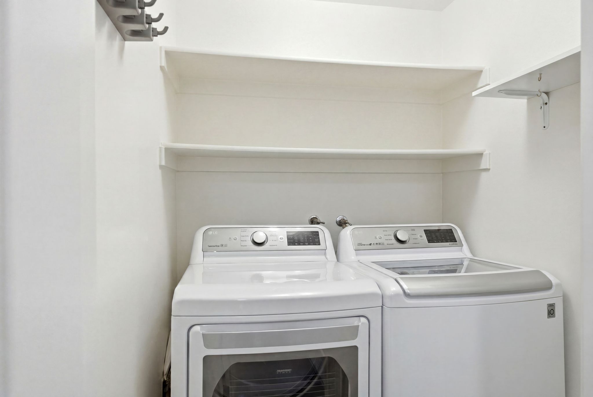 Private laundry room within unit.