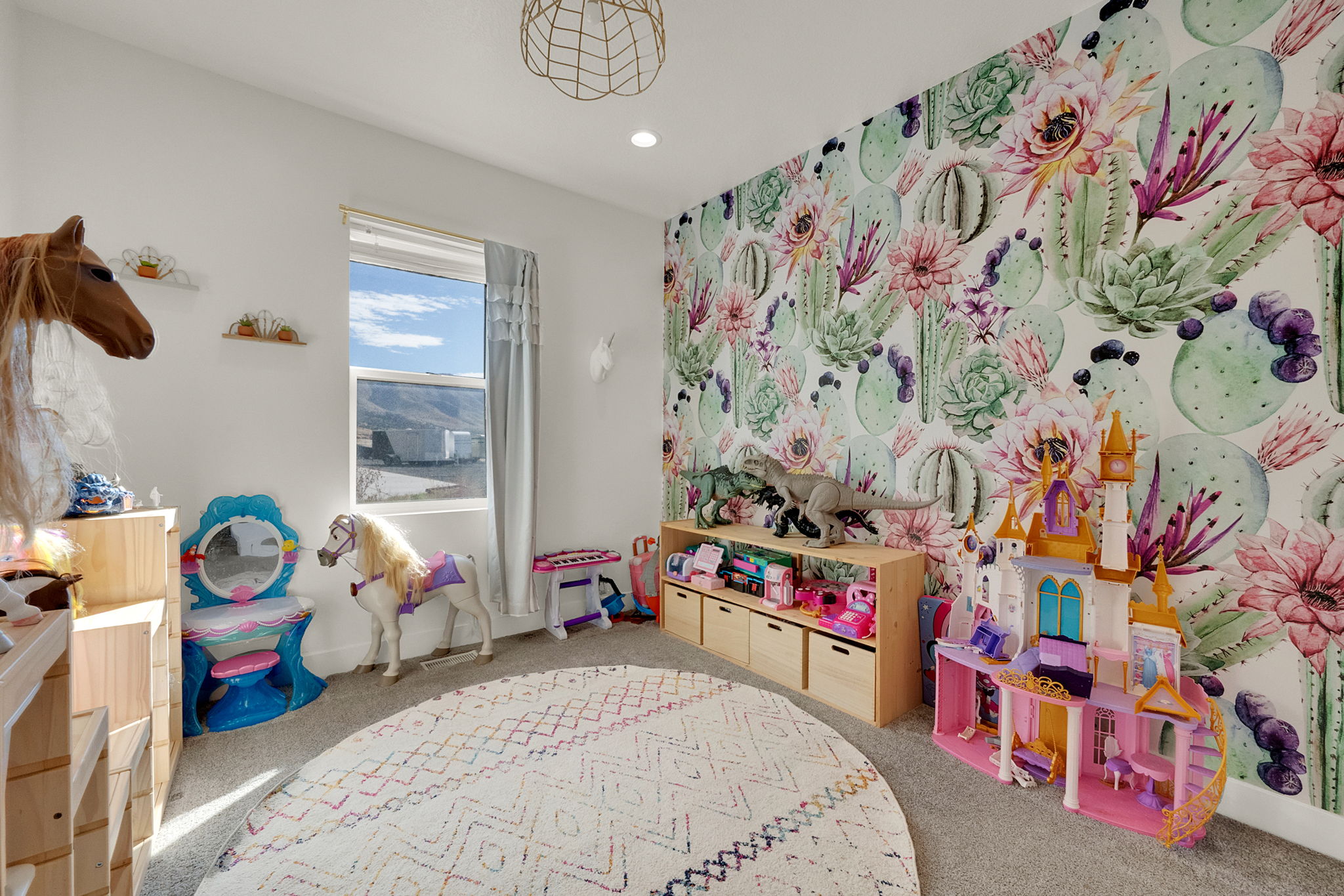 Accent wall featuring botanical-themed wallpaper