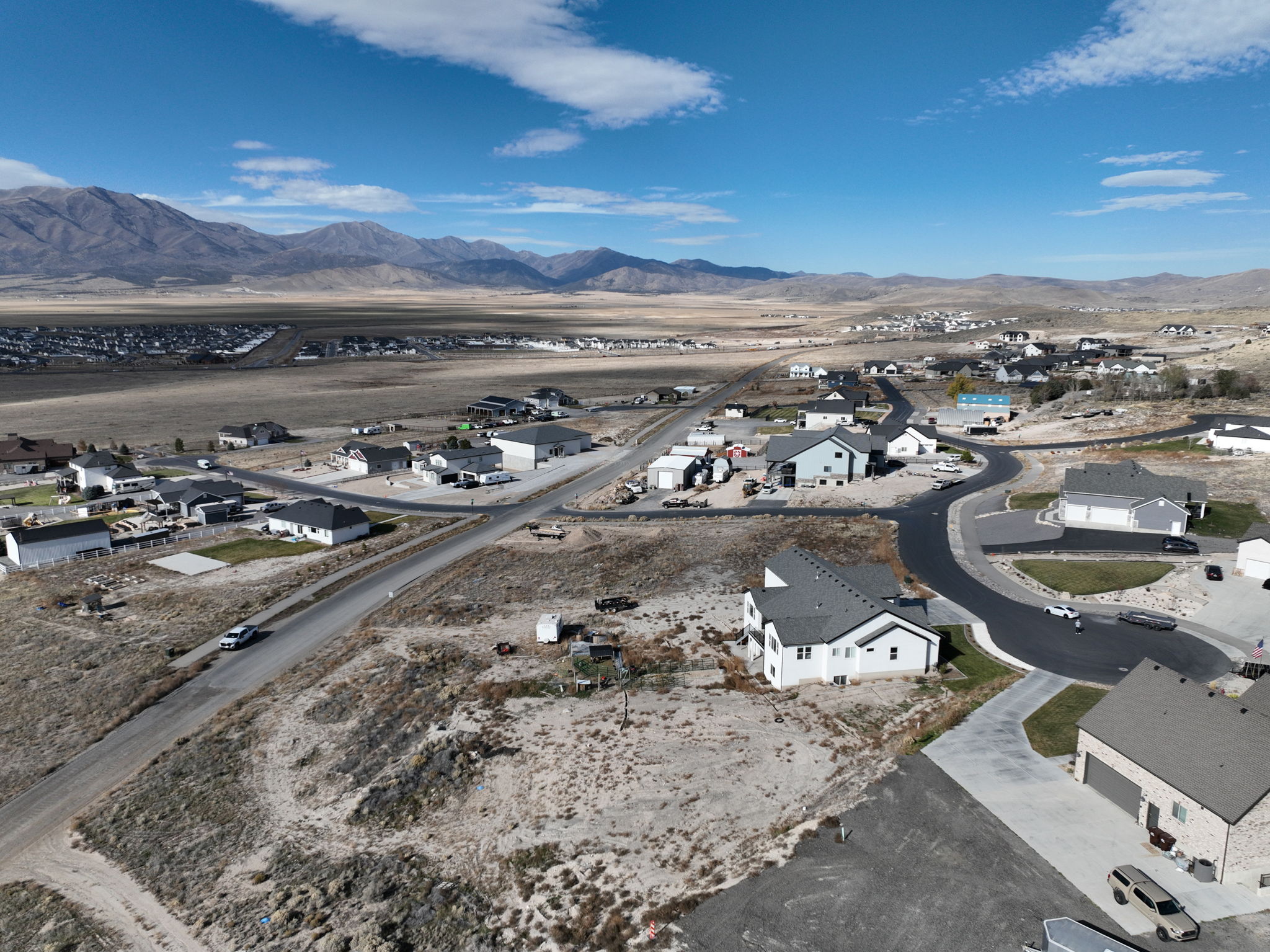 Expansive aerial perspective showcasing a neighborhood with newly constructed homes