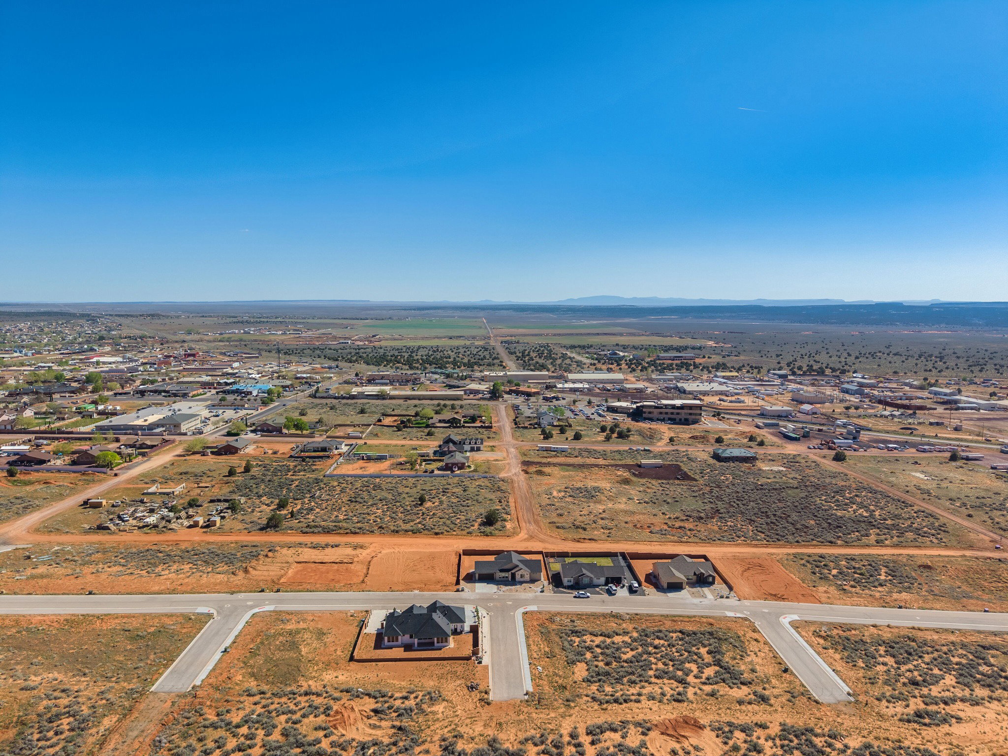 Aerial perspective showcasing a residential development with newly constructed homes
