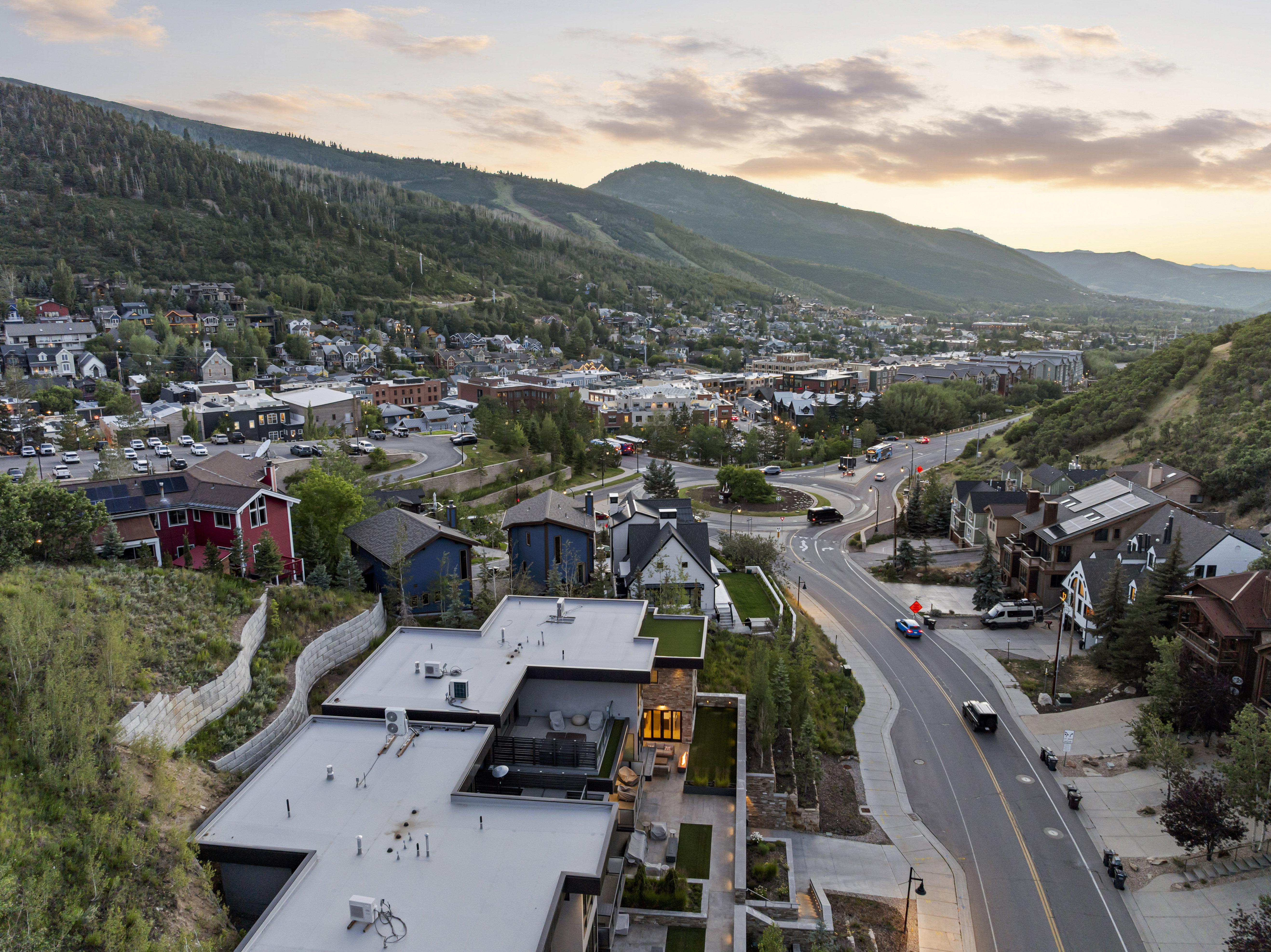 Elevated aerial perspective showcasing a mountainous landscape and surrounding architecture