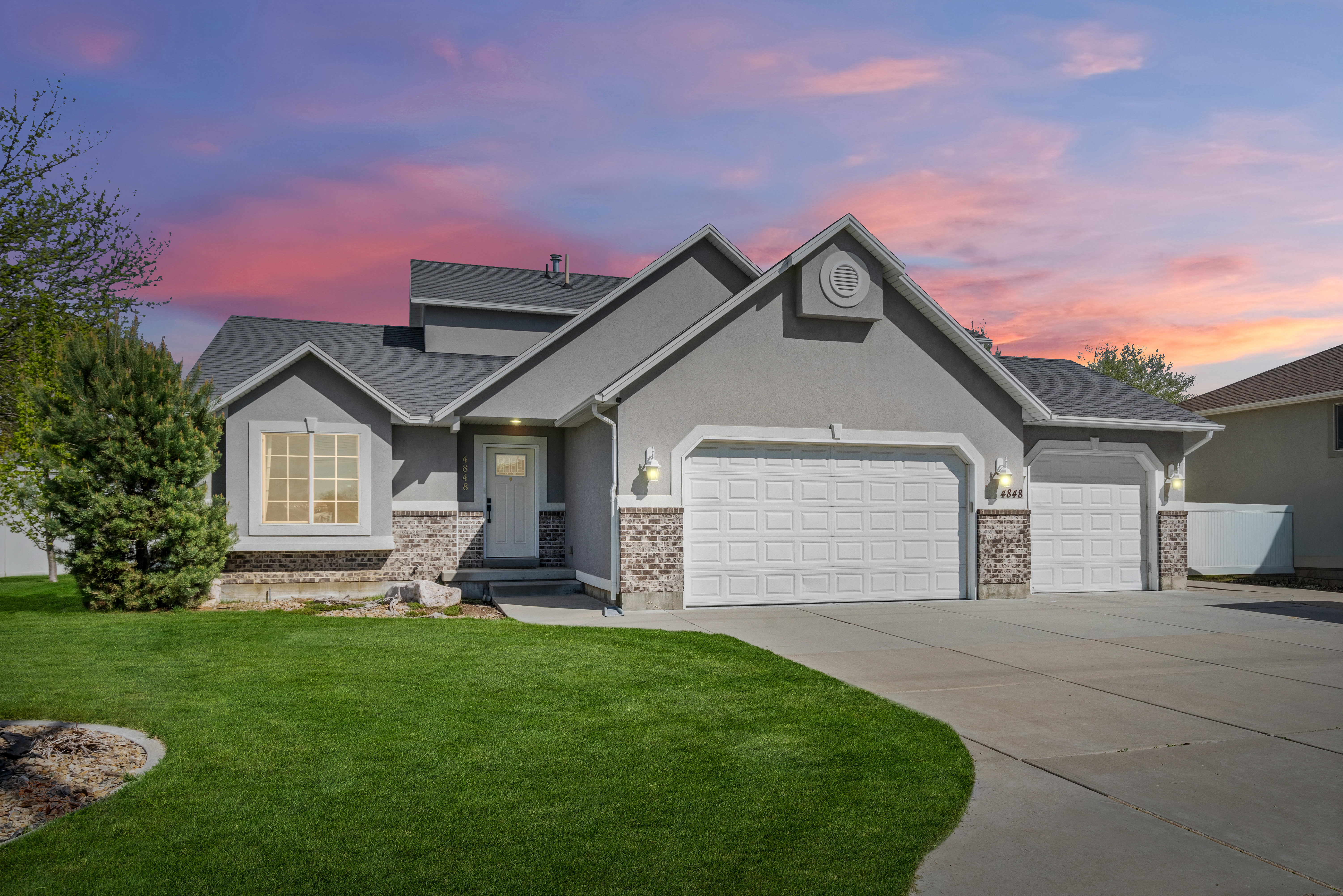 Stucco exterior with stone accent detailing