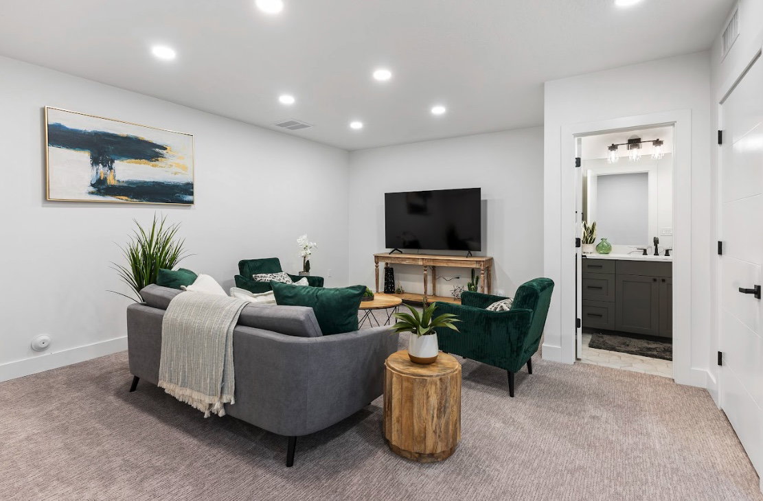 Carpeted living area featuring recessed lighting