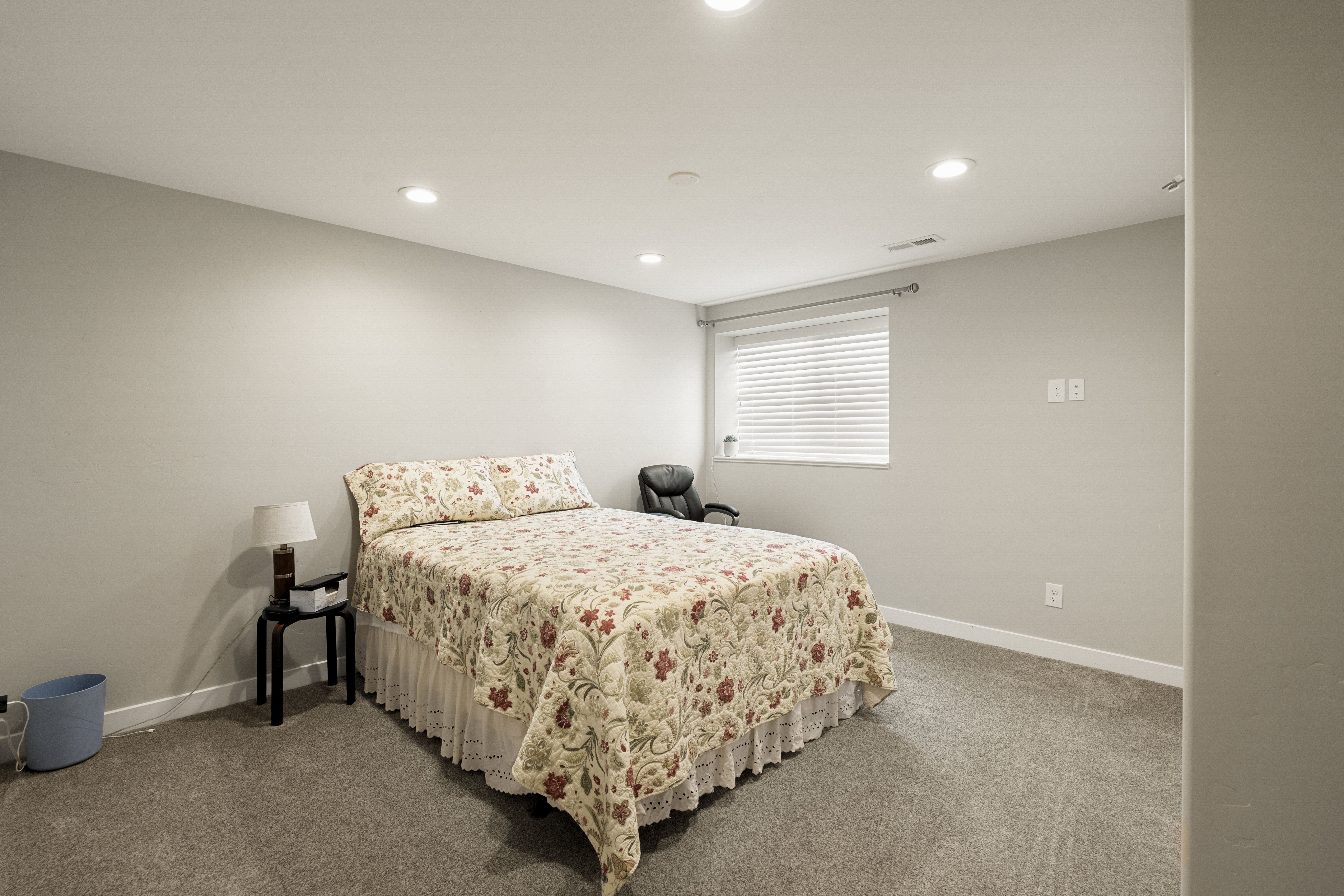 Bedroom featuring recessed lighting, a window with horizontal blinds, light gray walls, white baseboards, and carpet flooring