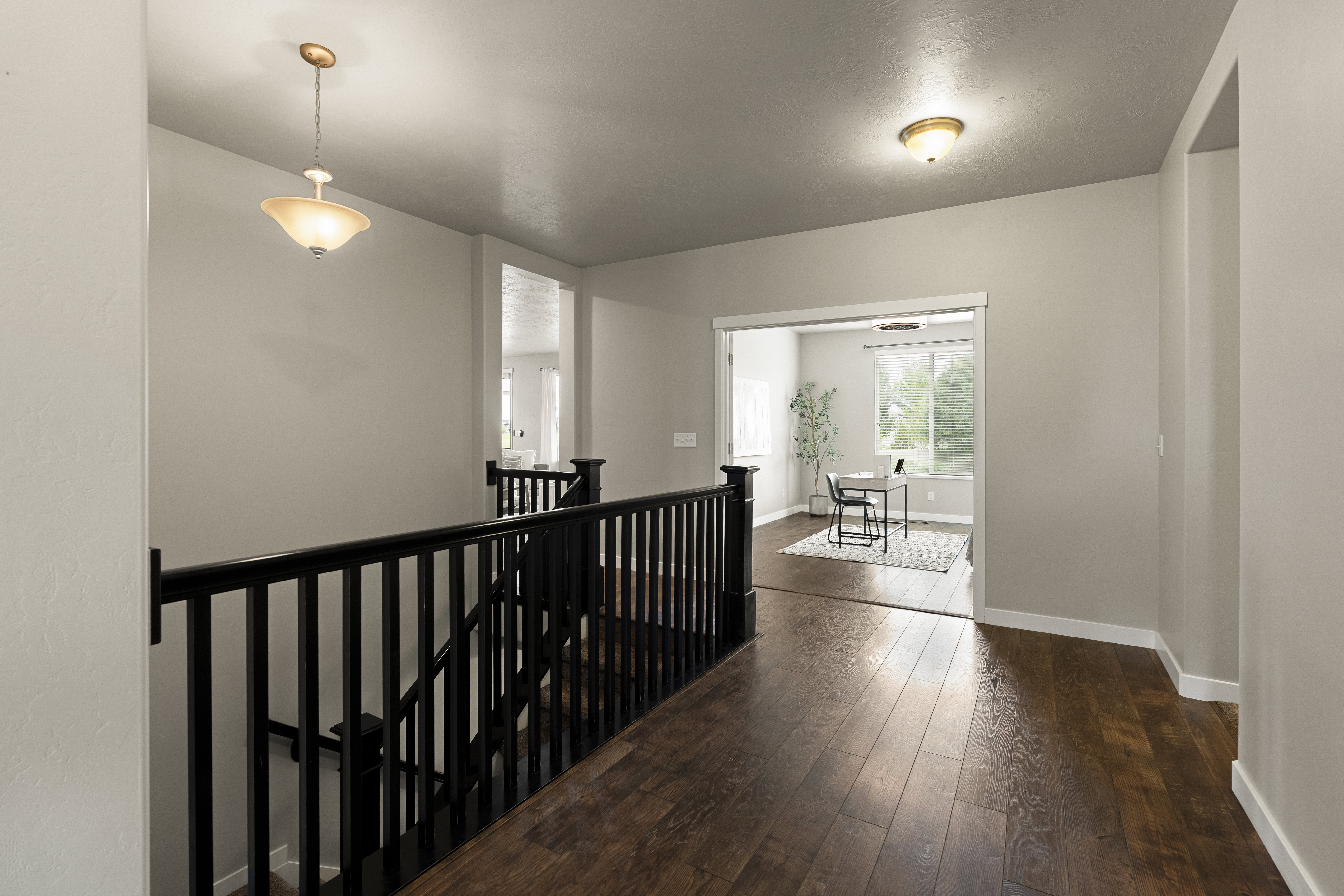 Hardwood-style flooring throughout the upper landing