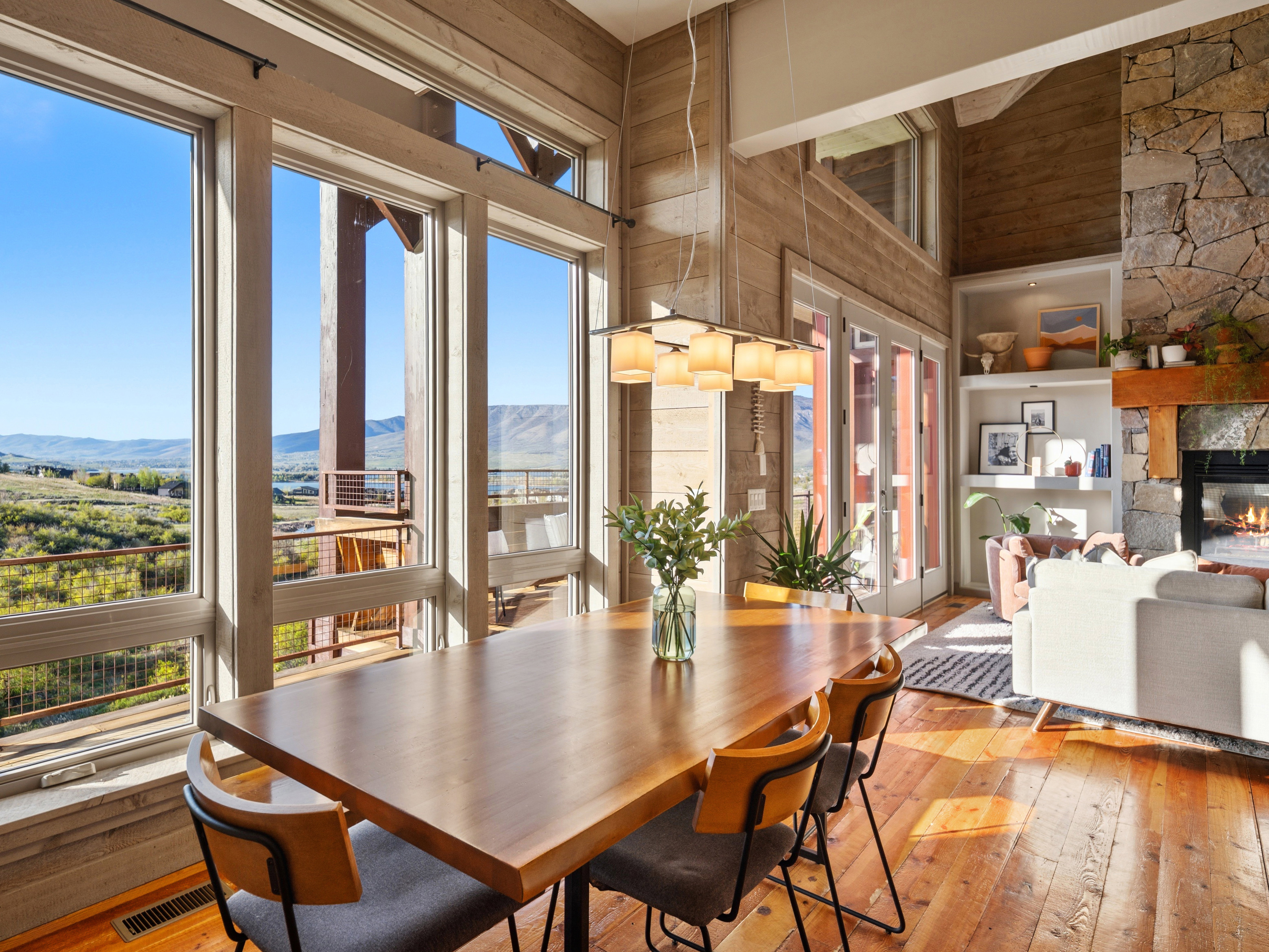 Dining area featuring a rectangular wood dining table and wood-finish flooring