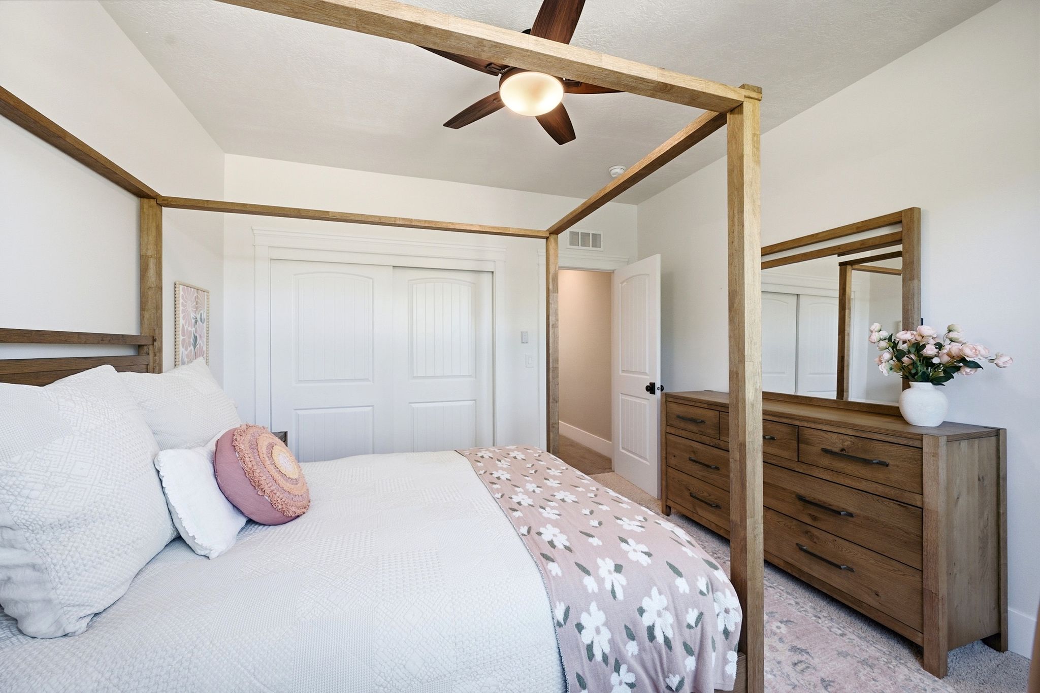 Recessed lighting and ceiling fan overhead