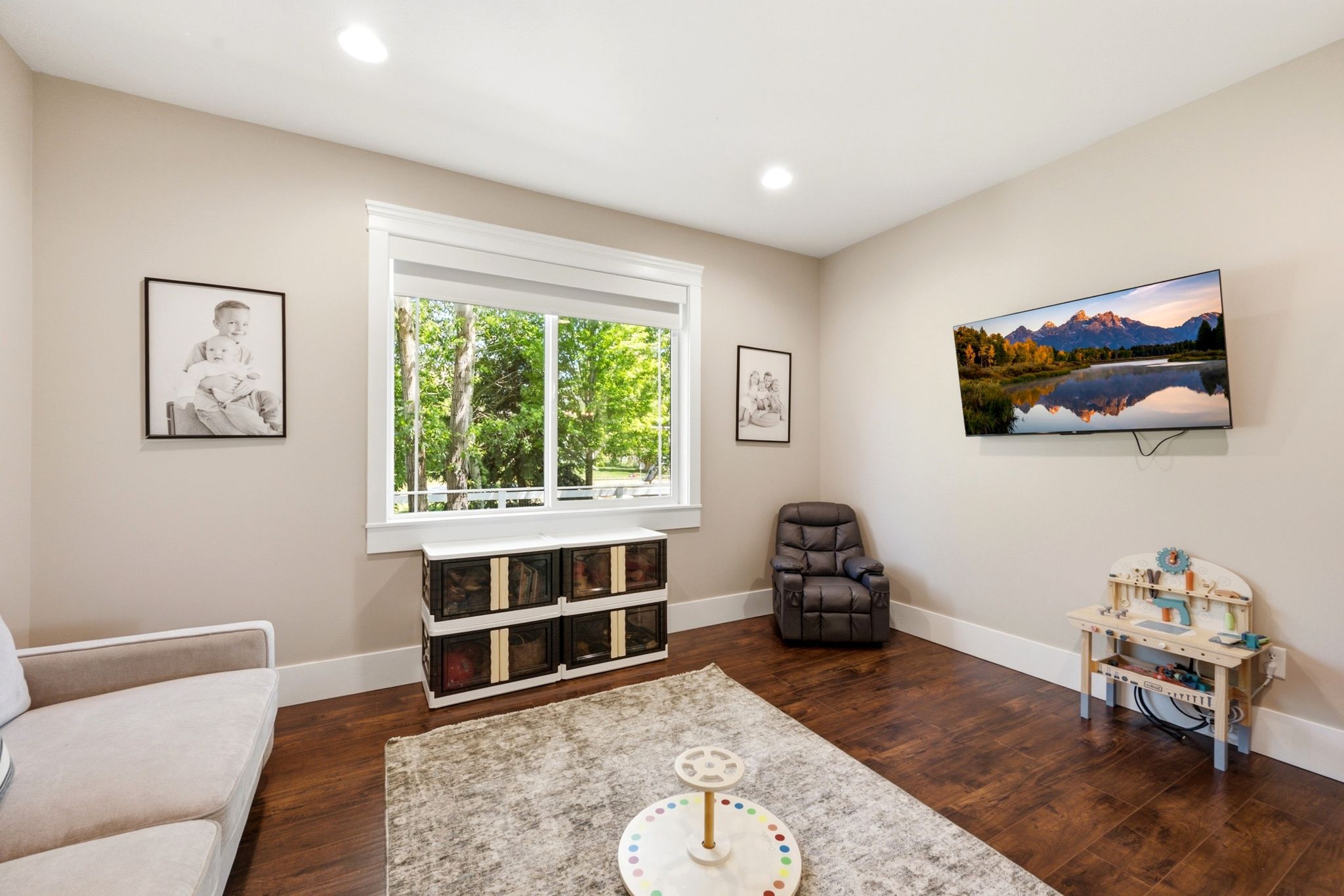 Spacious room with recessed lighting and warm beige wall tones